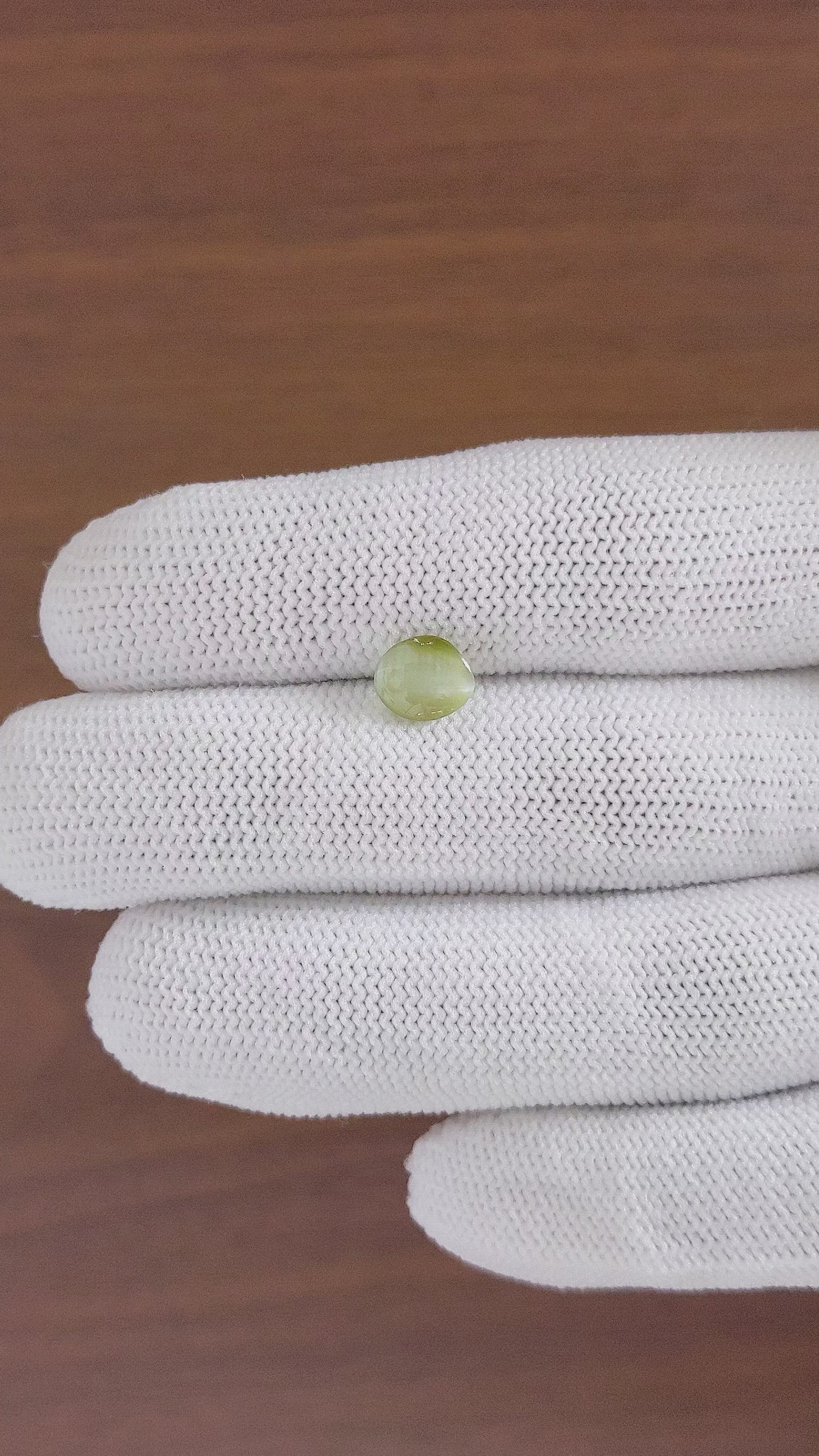 1.39 Ct. Yellowish Green Cabochon Chrysoberyl from Ceylon (Sri Lanka) Size Video