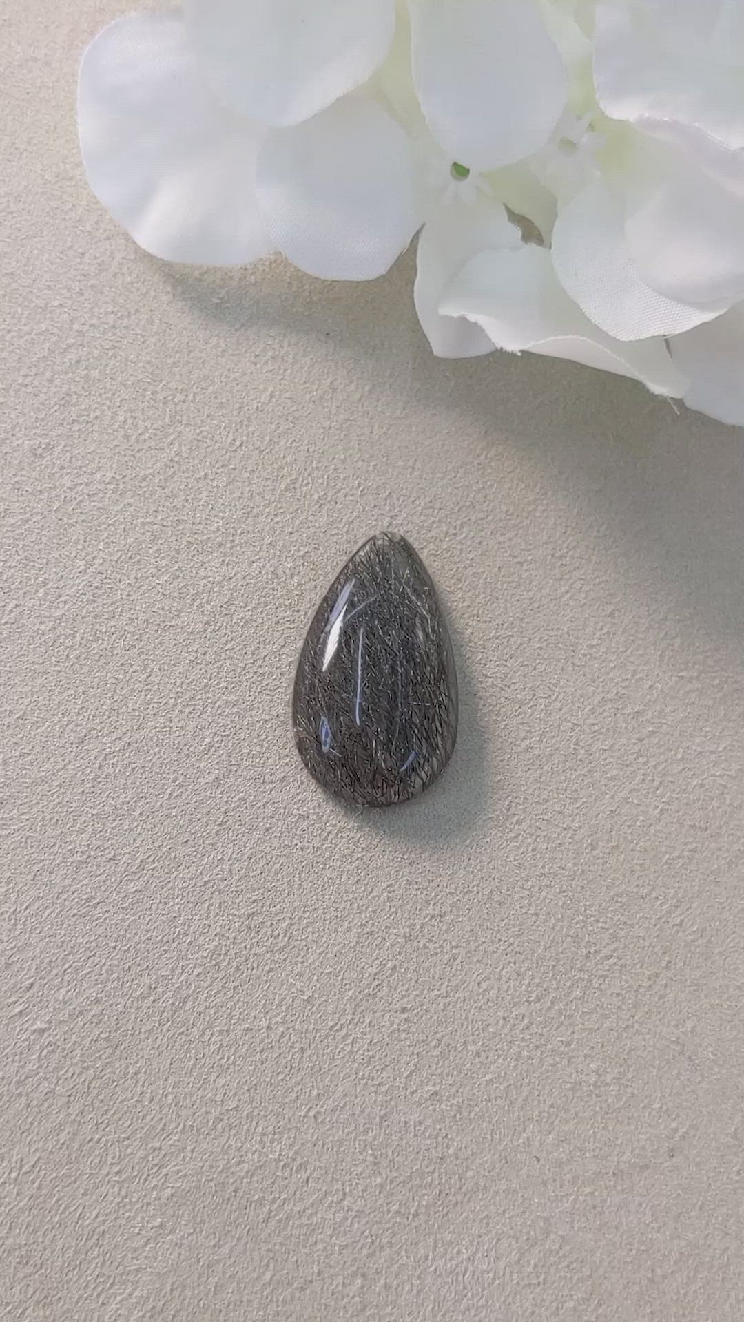 27.78 Ct. Cabochon Rutilated Quartz from Ceylon (Sri Lanka) Size Video