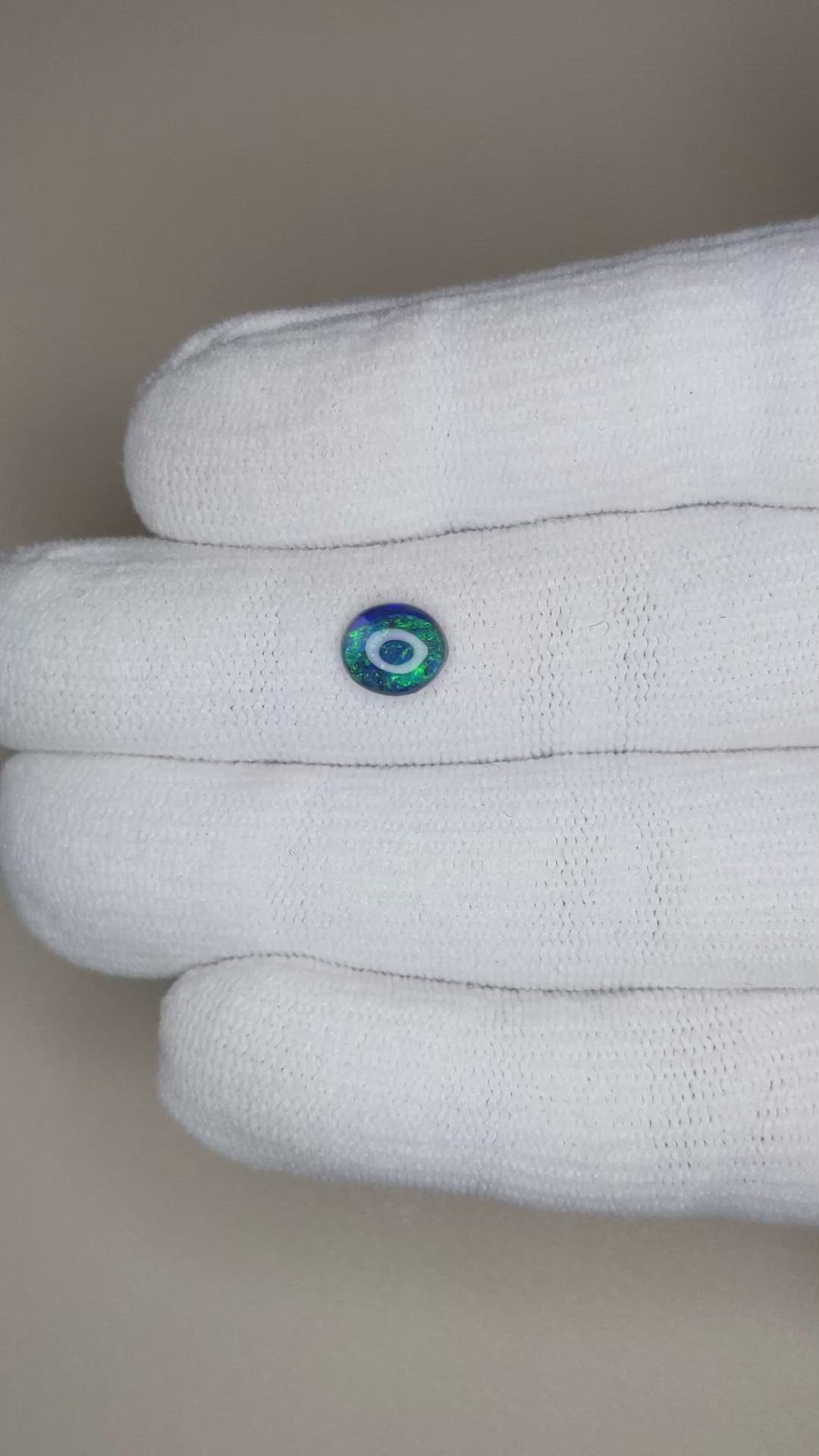 0.74 Ct. Cabochon Black Opal from Australia Size Video