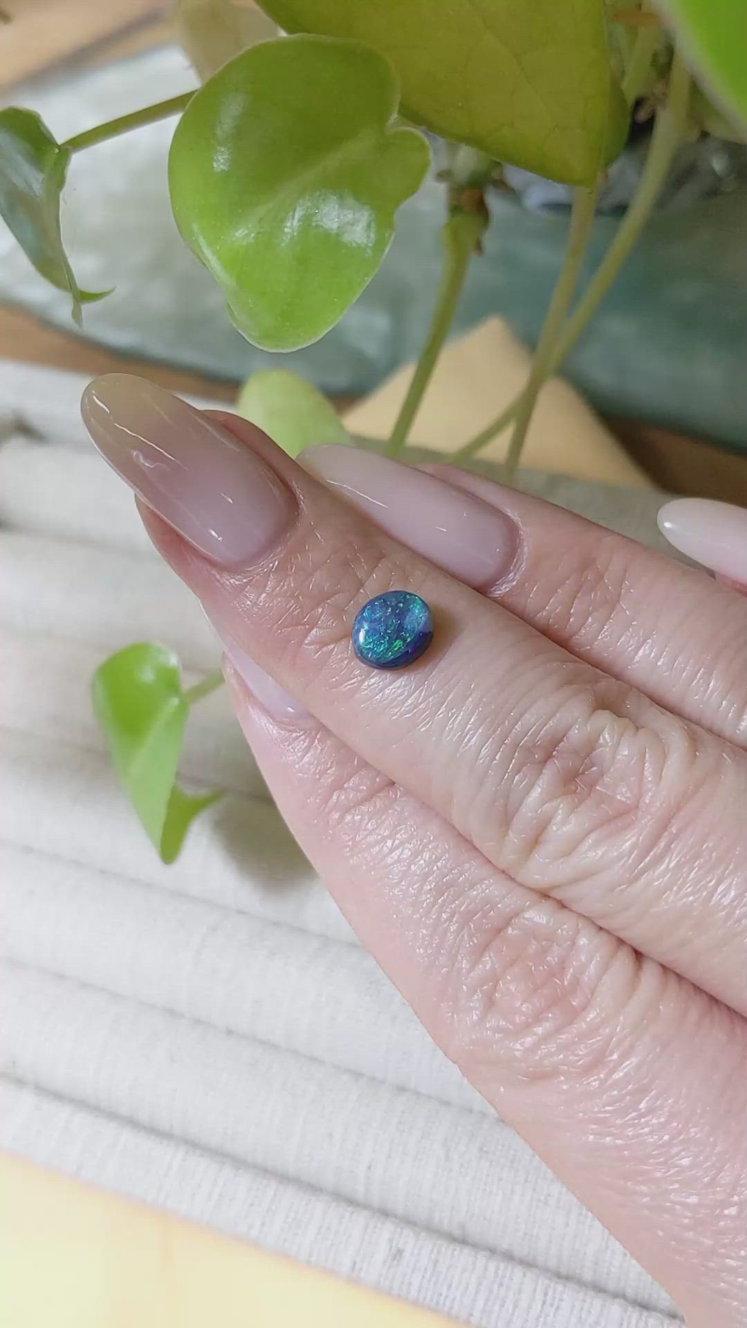 0.74 Ct. Cabochon Black Opal from Australia Size Video