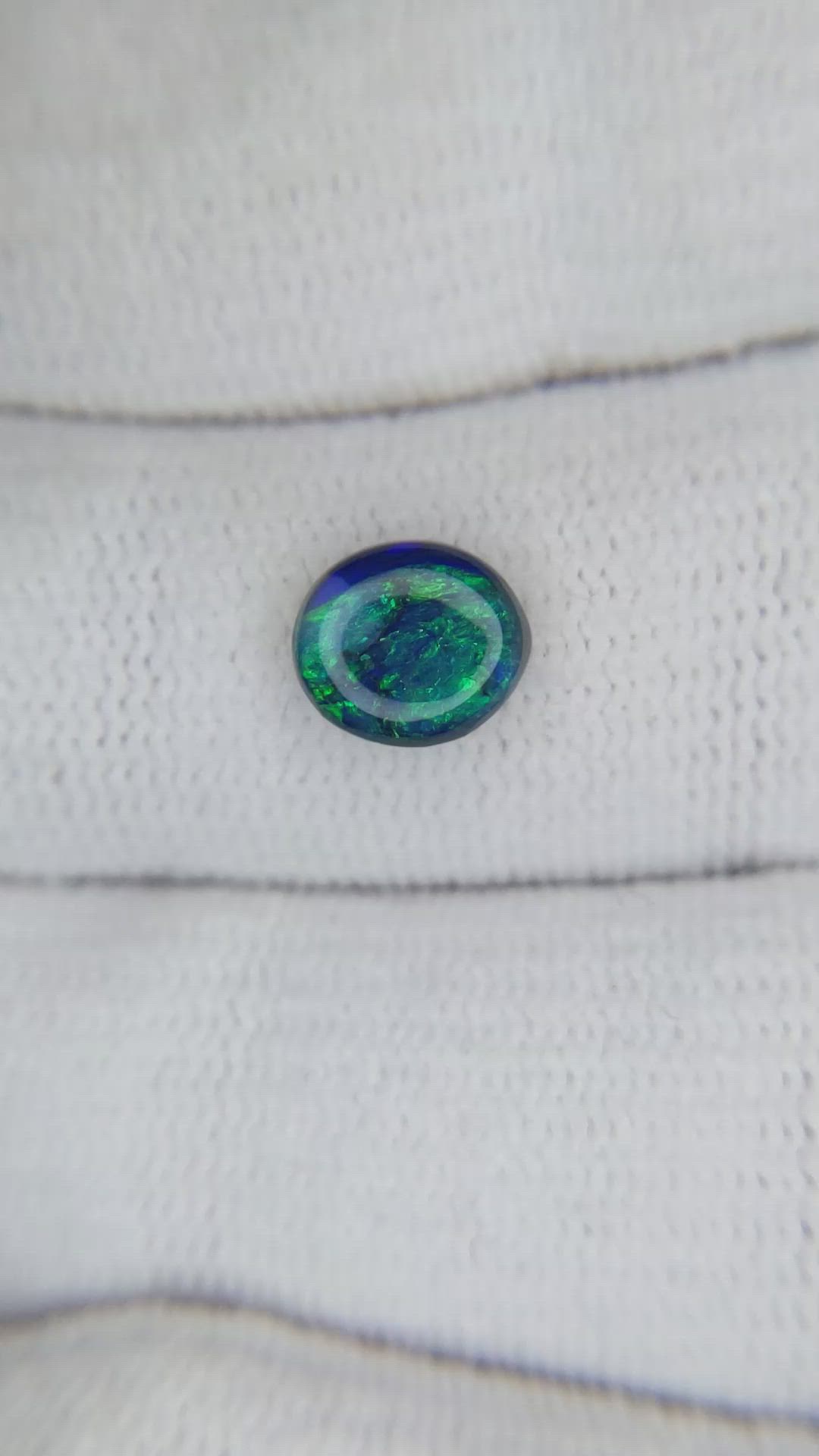 0.74 Ct. Cabochon Black Opal from Australia Size Video