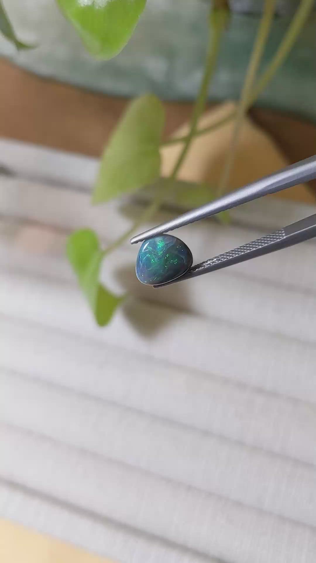 0.93 Ct. Cabochon Black Opal from Australia Size Video