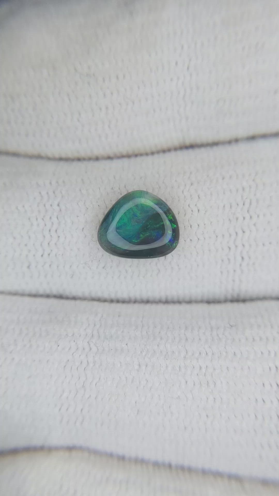 0.93 Ct. Cabochon Black Opal from Australia Size Video