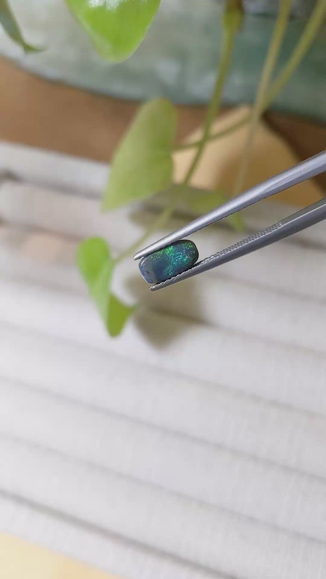 0.69 Ct. Cabochon Black Opal from Australia Size Video