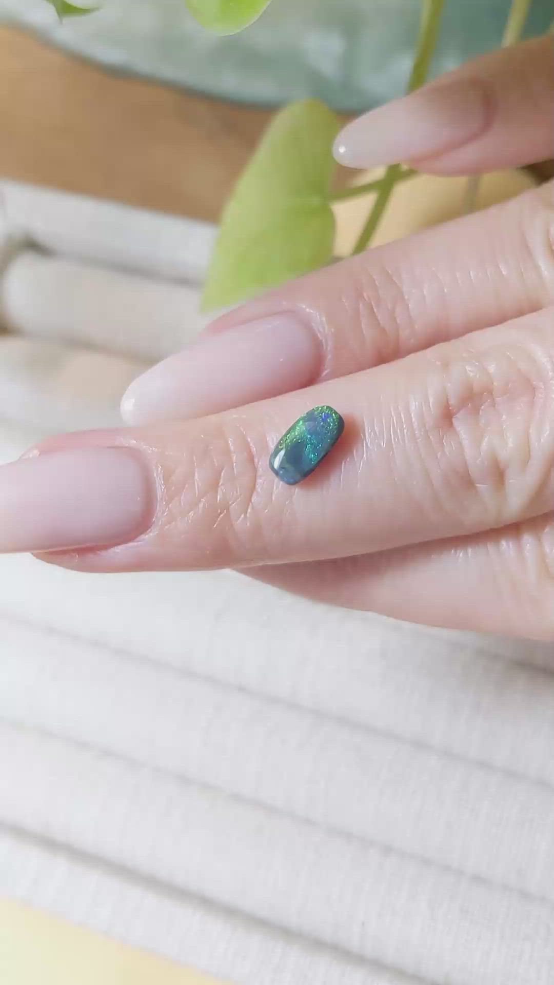 0.69 Ct. Cabochon Black Opal from Australia Size Video