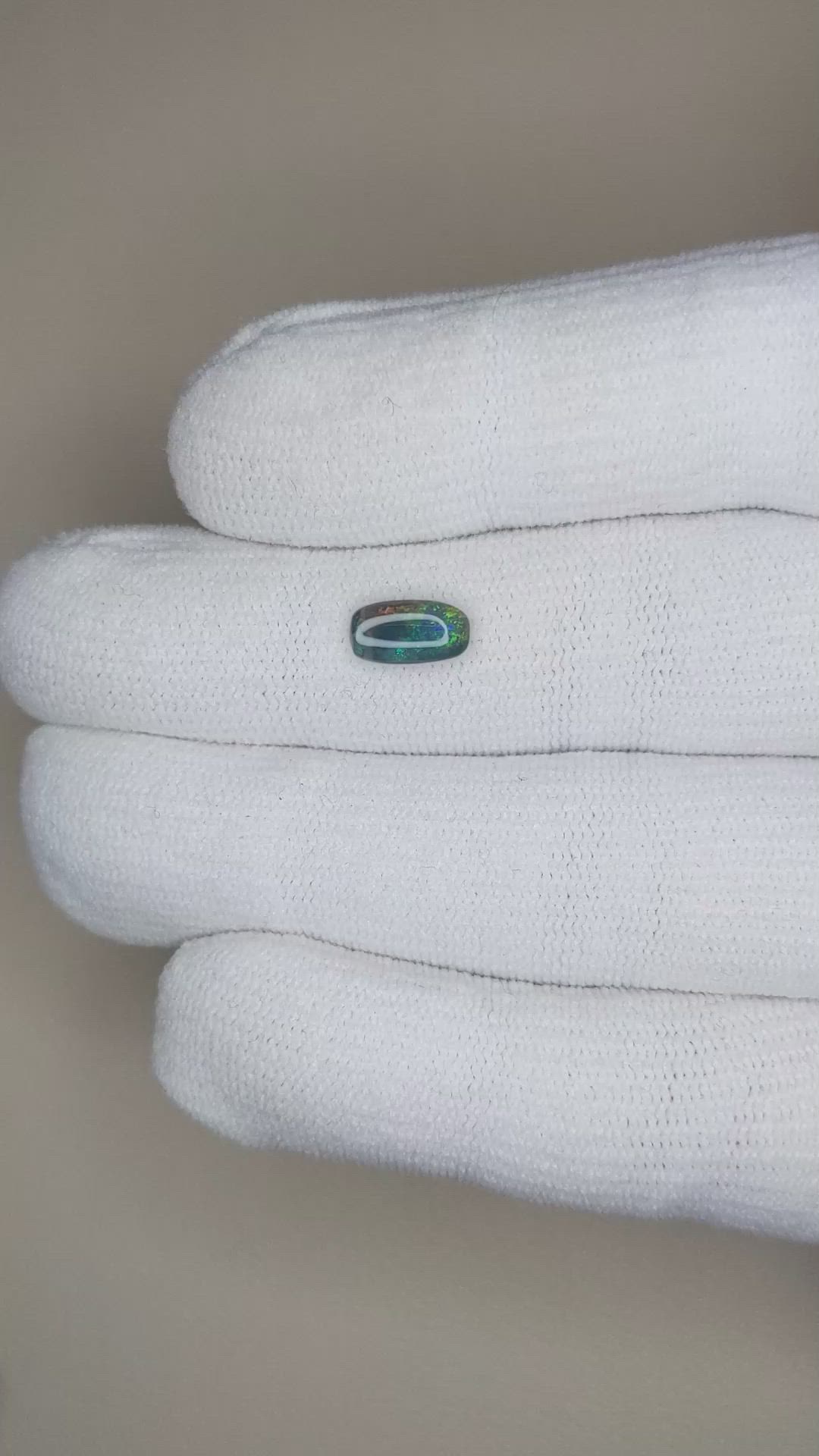 0.69 Ct. Cabochon Black Opal from Australia Size Video