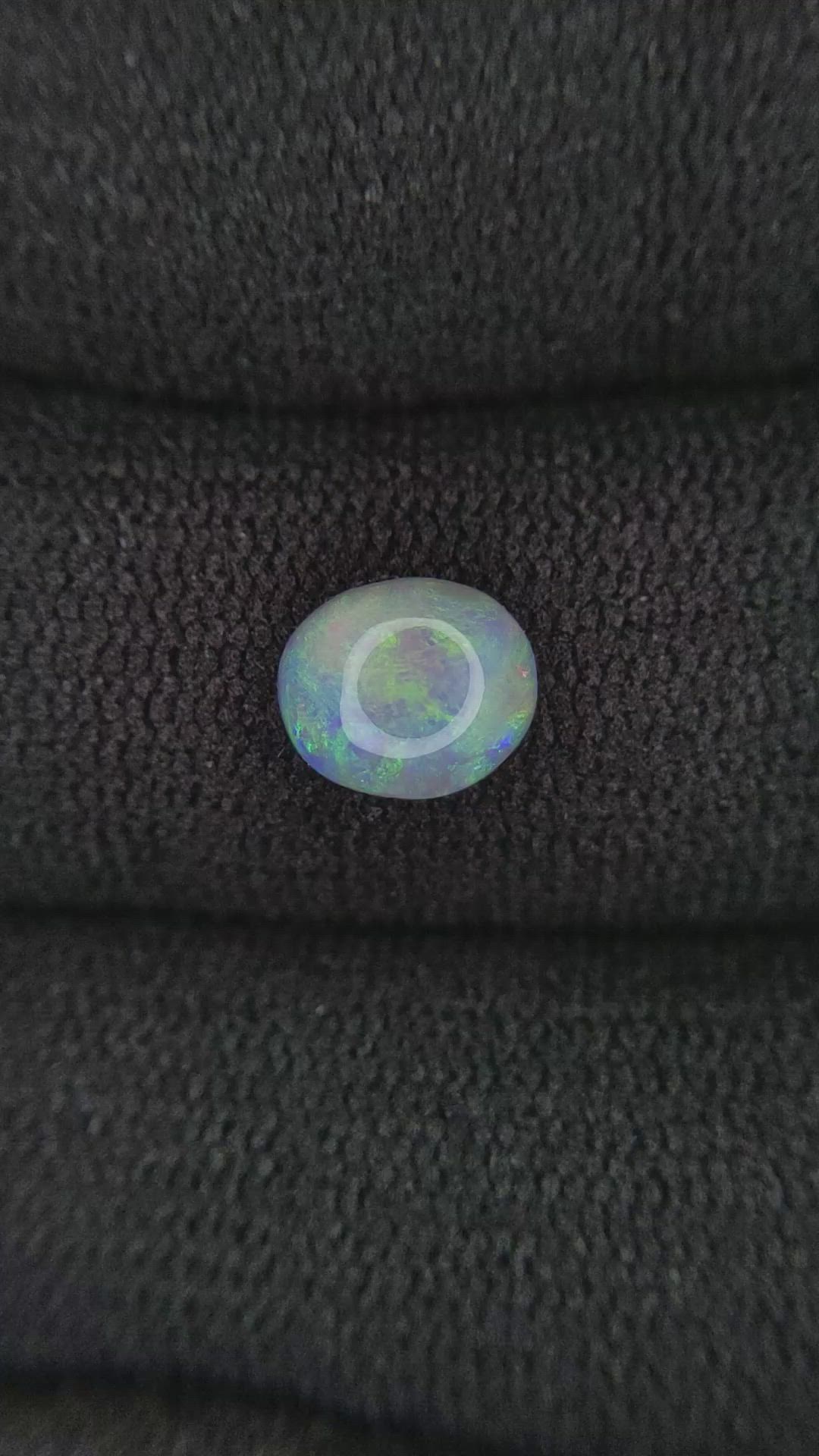 0.83 Ct. Cabochon Black Opal from Australia Size Video