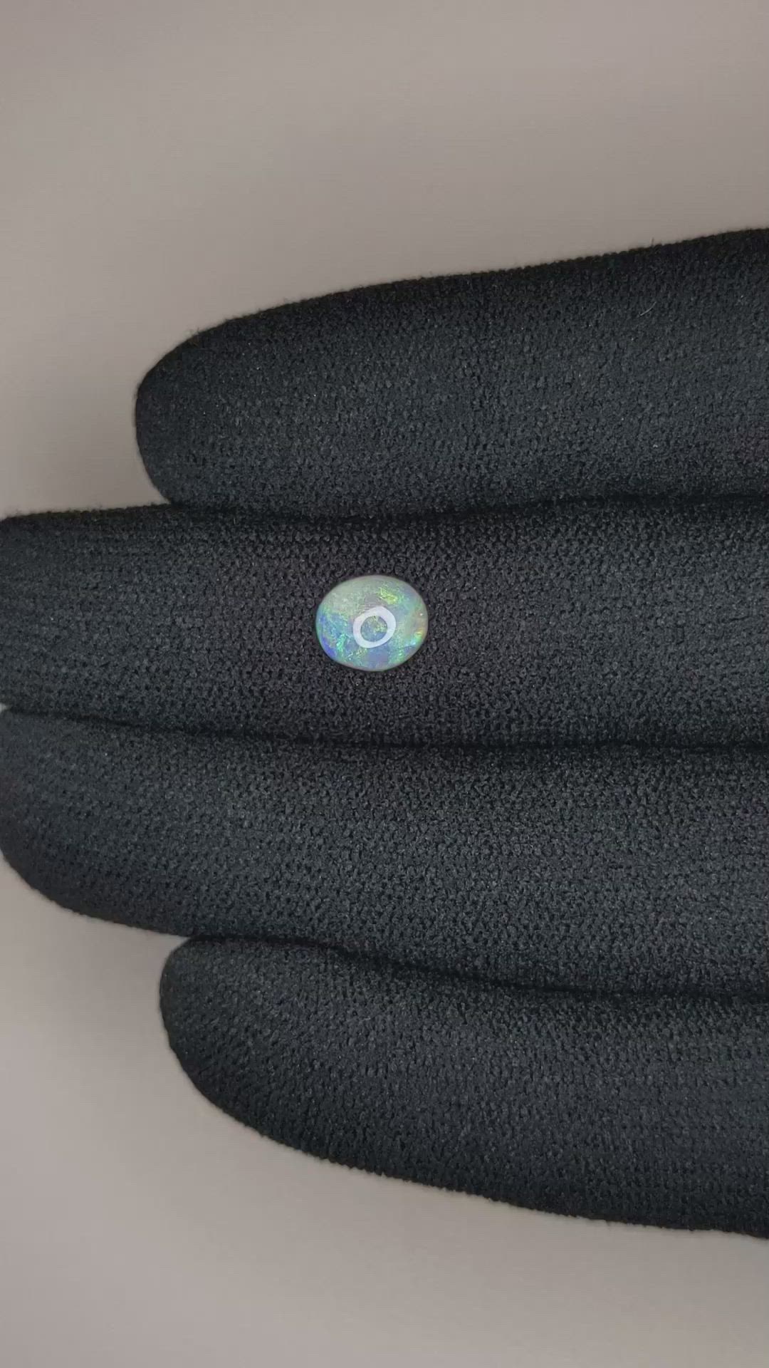 0.83 Ct. Cabochon Black Opal from Australia Size Video