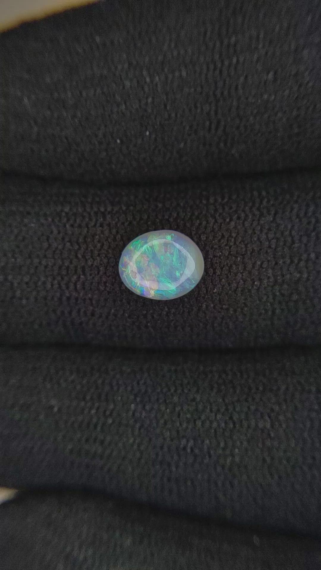 0.74 Ct. Cabochon Black Opal from Australia Size Video