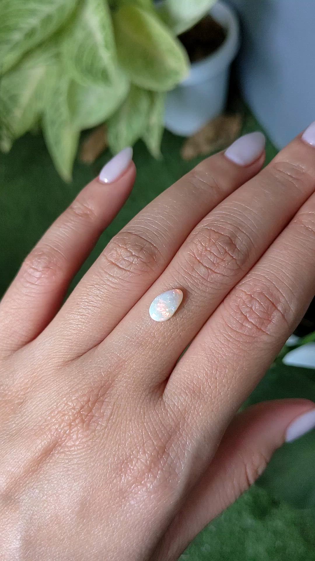 0.80 Ct. Cabochon White Opal from Australia Size Video