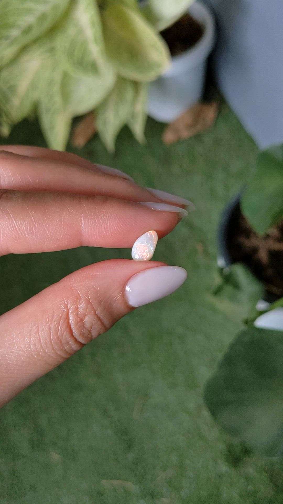 0.80 Ct. Cabochon White Opal from Australia Size Video