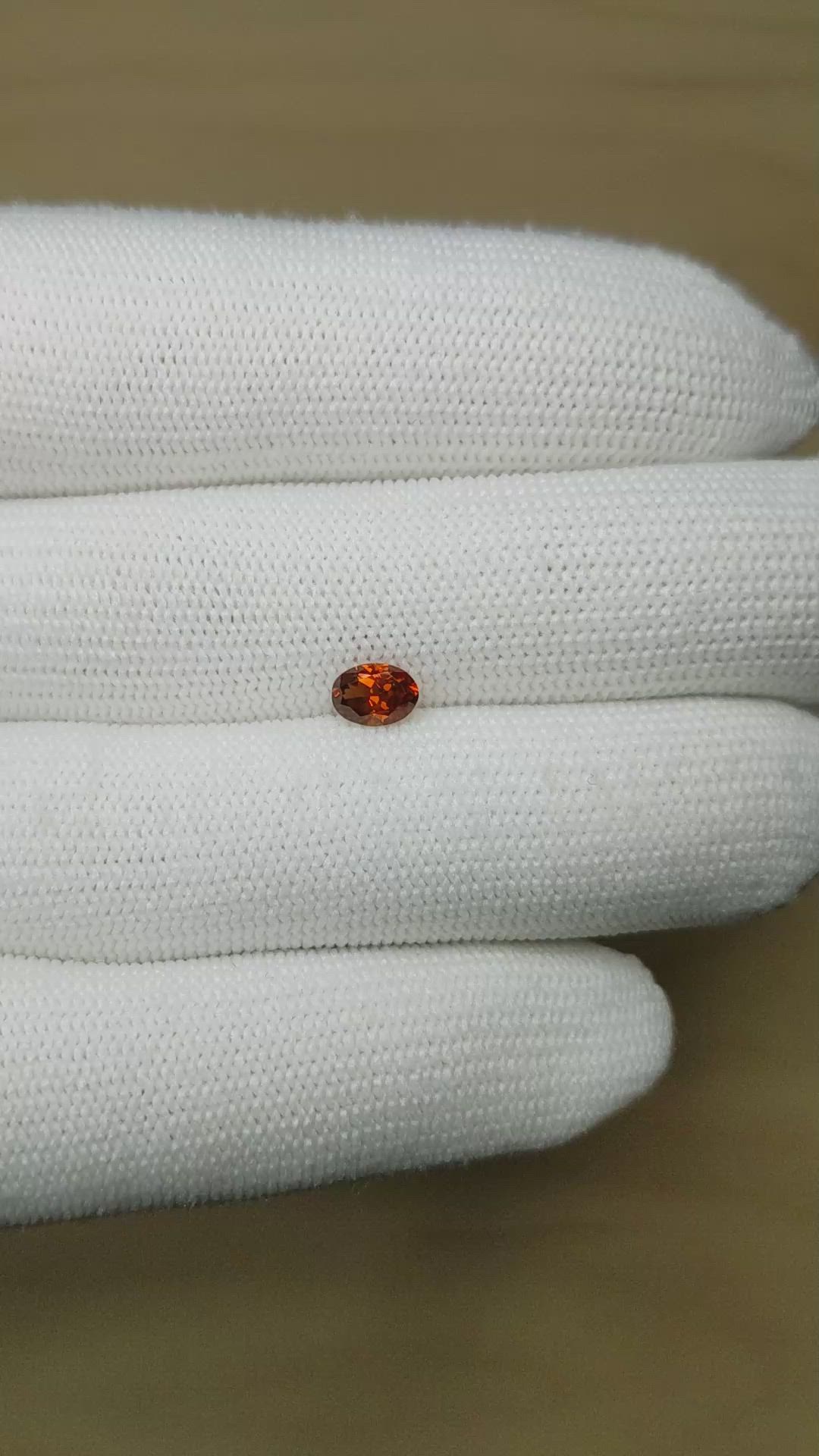0.64 Ct. Brownish Orange Garnet from Montana Size Video