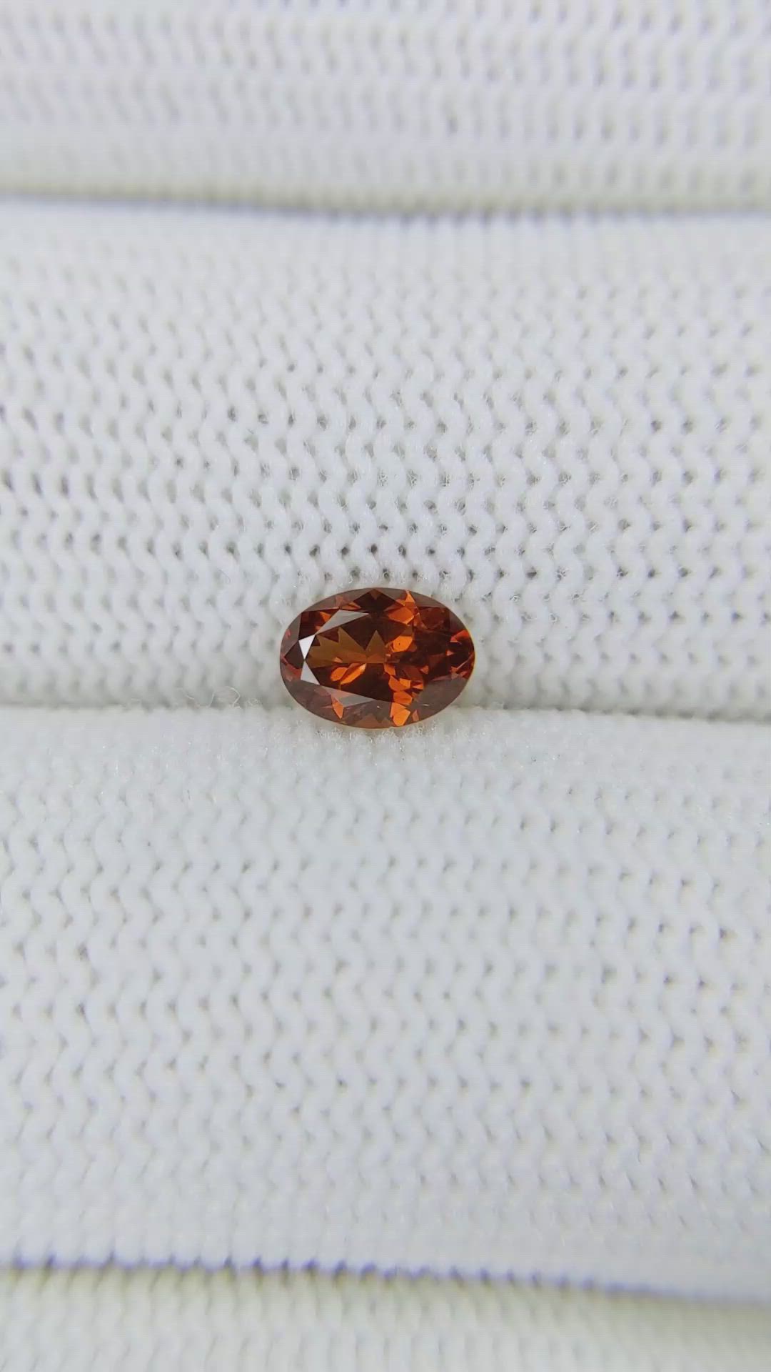 0.64 Ct. Brownish Orange Garnet from Montana Size Video