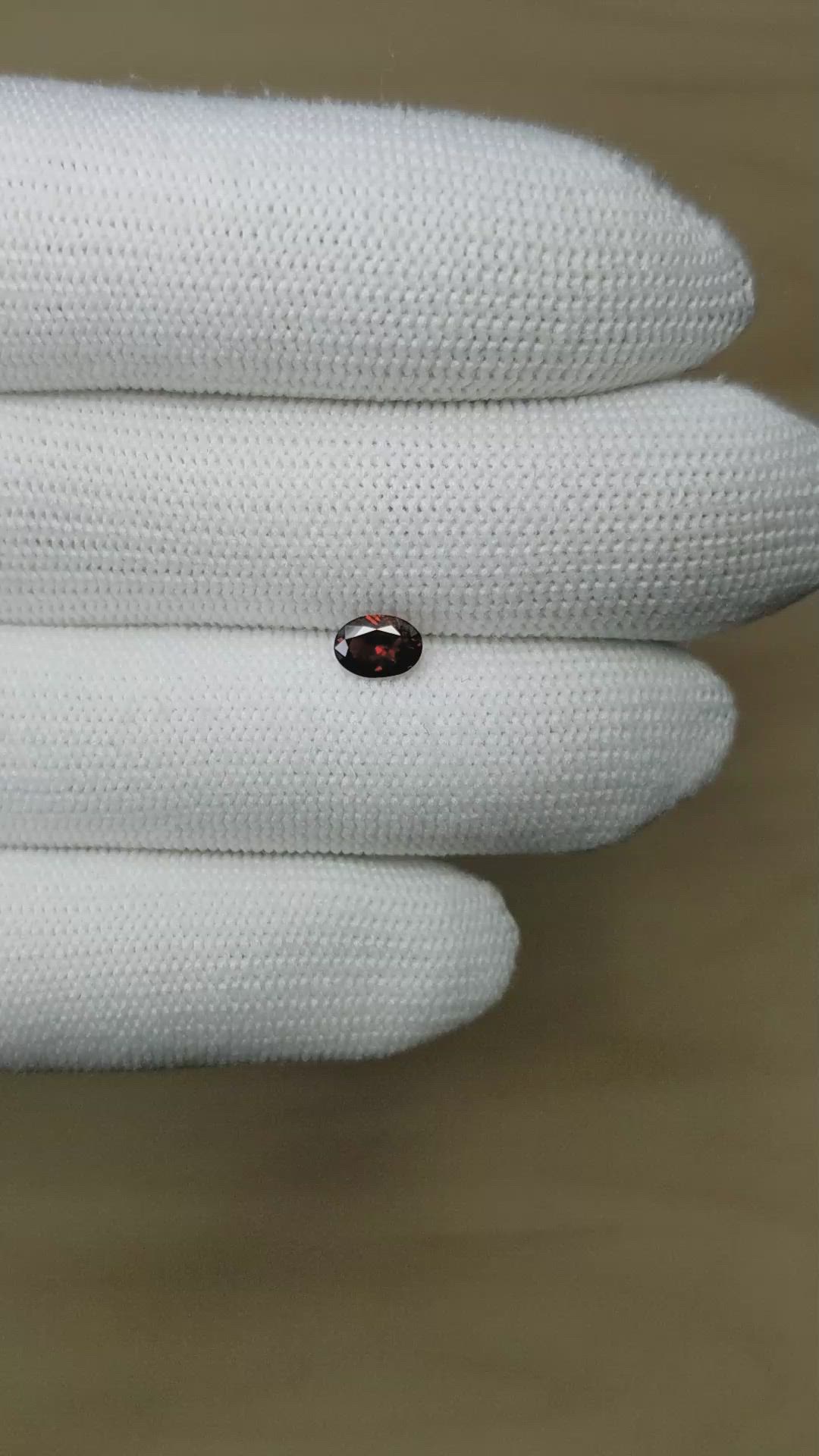 1.06 Ct. Orangish Red Garnet from Montana Size Video