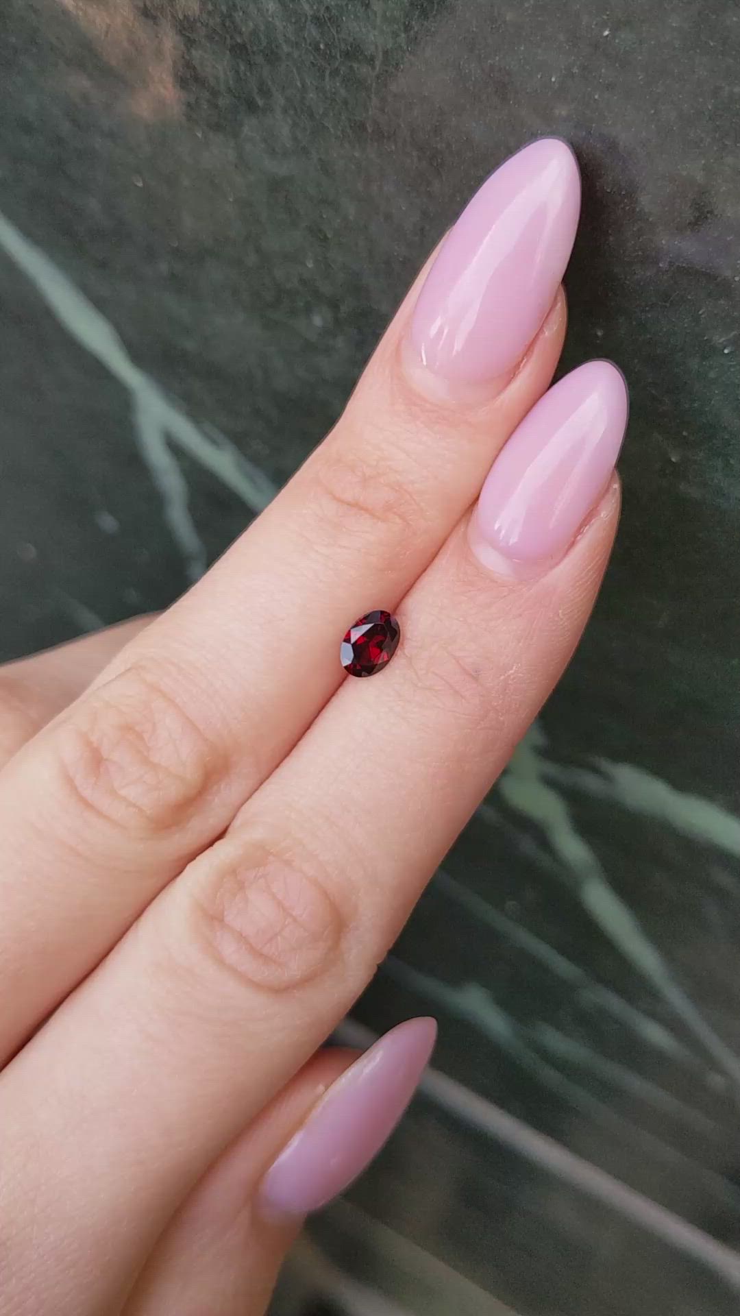 1.06 Ct. Orangish Red Garnet from Montana Size Video