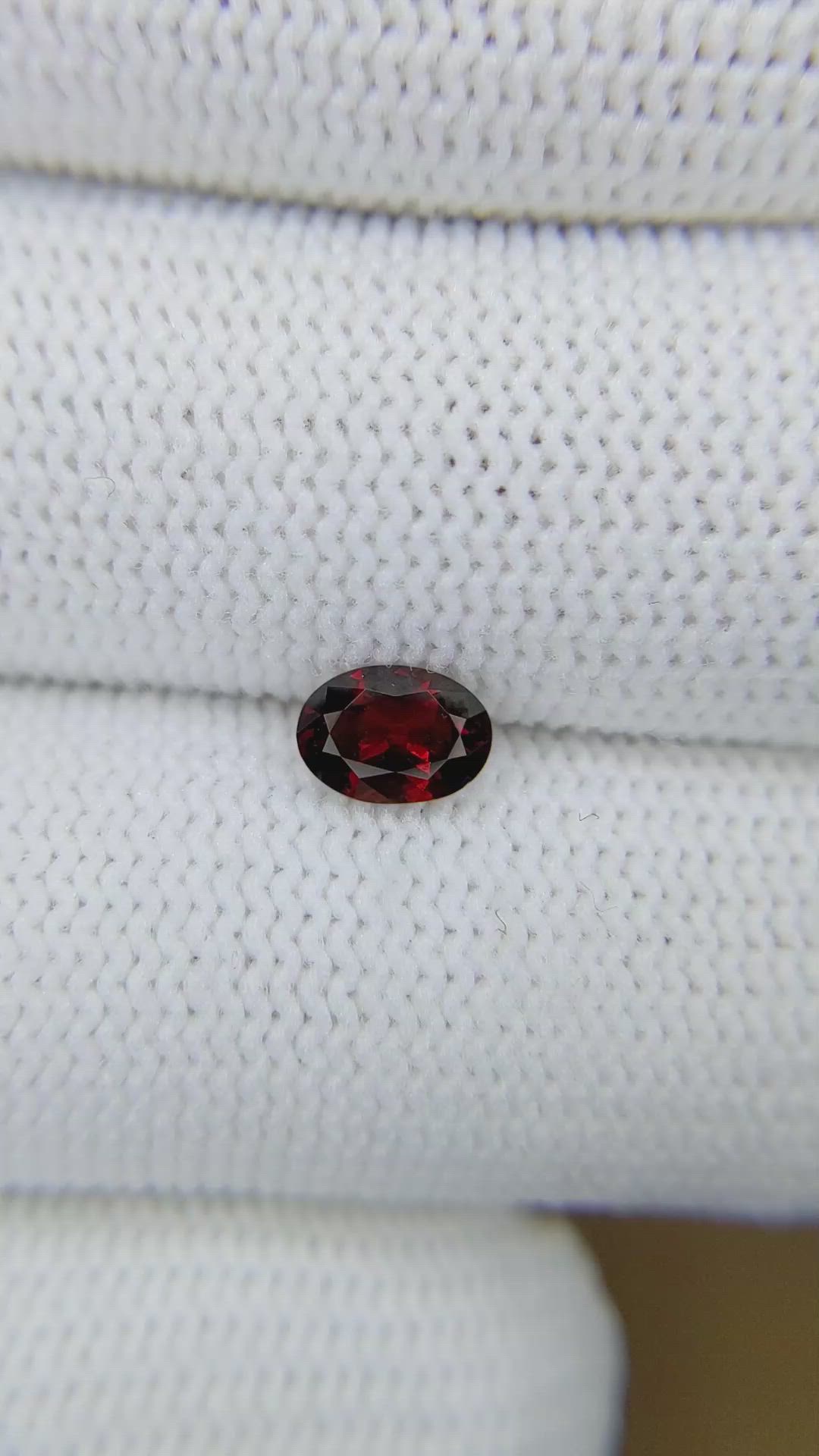 1.06 Ct. Orangish Red Garnet from Montana Size Video