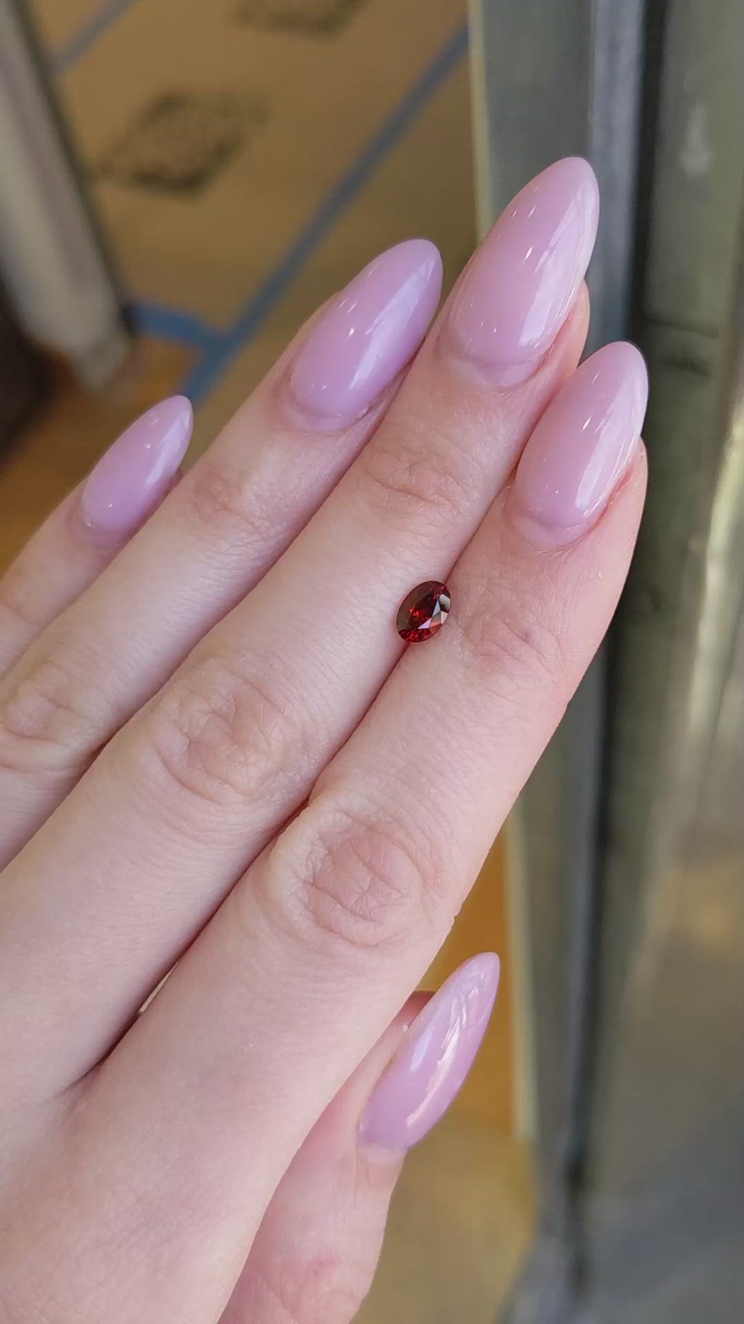 0.75 Ct. Reddish Orange Garnet from Montana Size Video