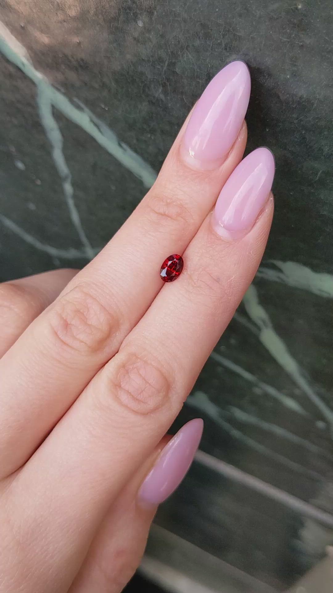 0.75 Ct. Reddish Orange Garnet from Montana Size Video