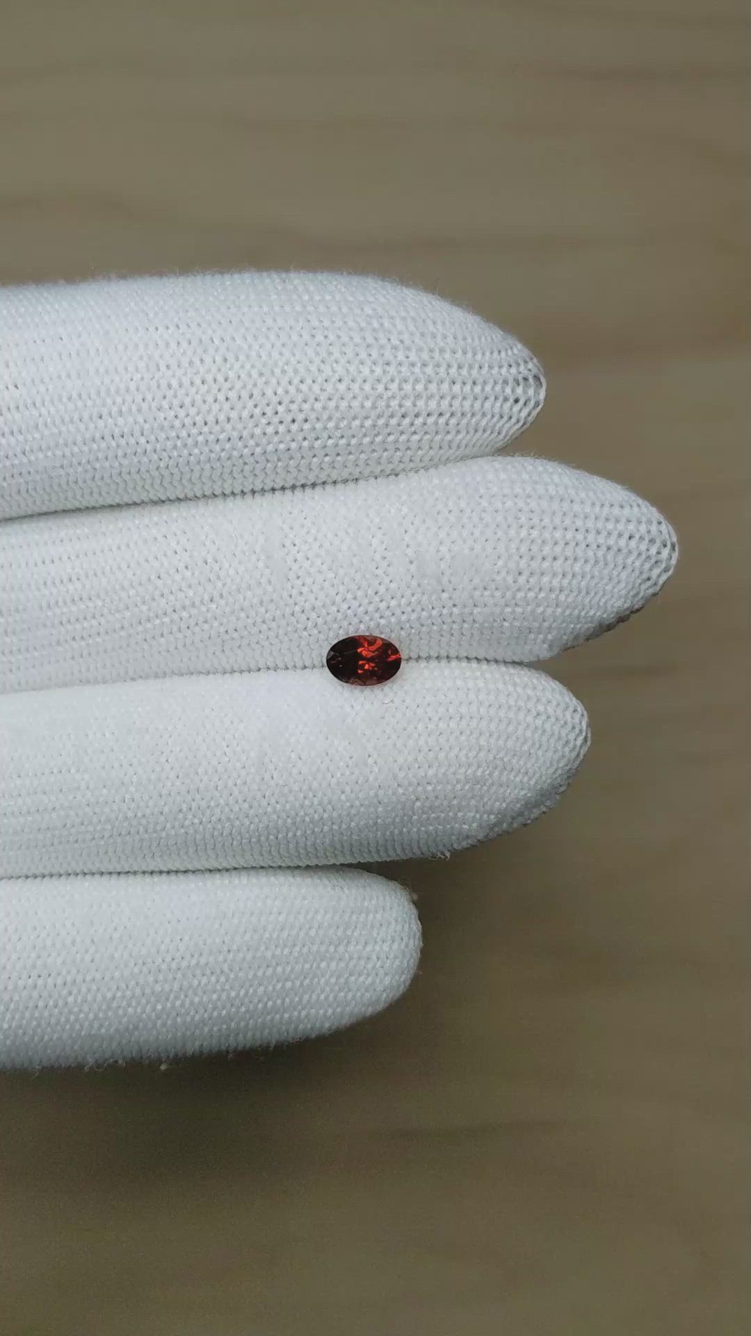 0.75 Ct. Reddish Orange Garnet from Montana Size Video