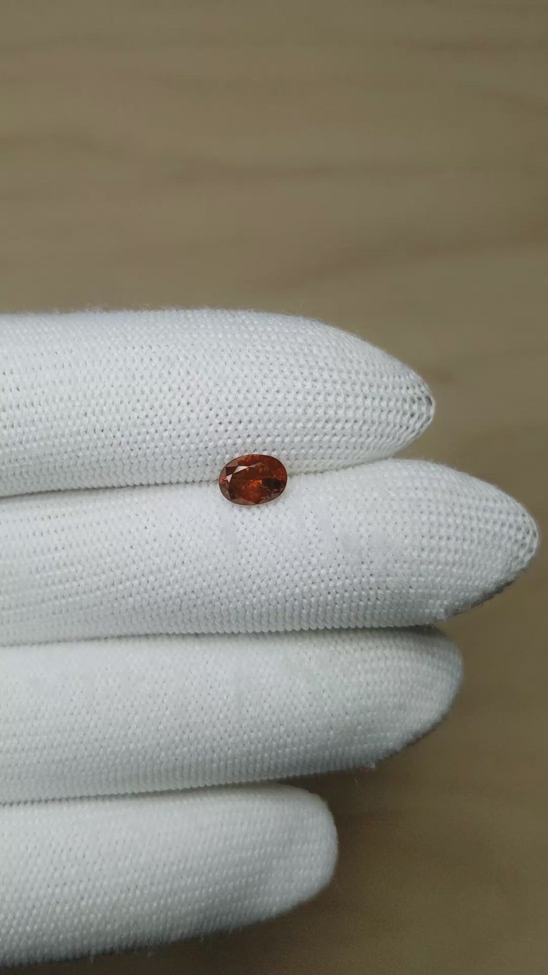 1.12 Ct. Reddish Orange Garnet from Montana Size Video