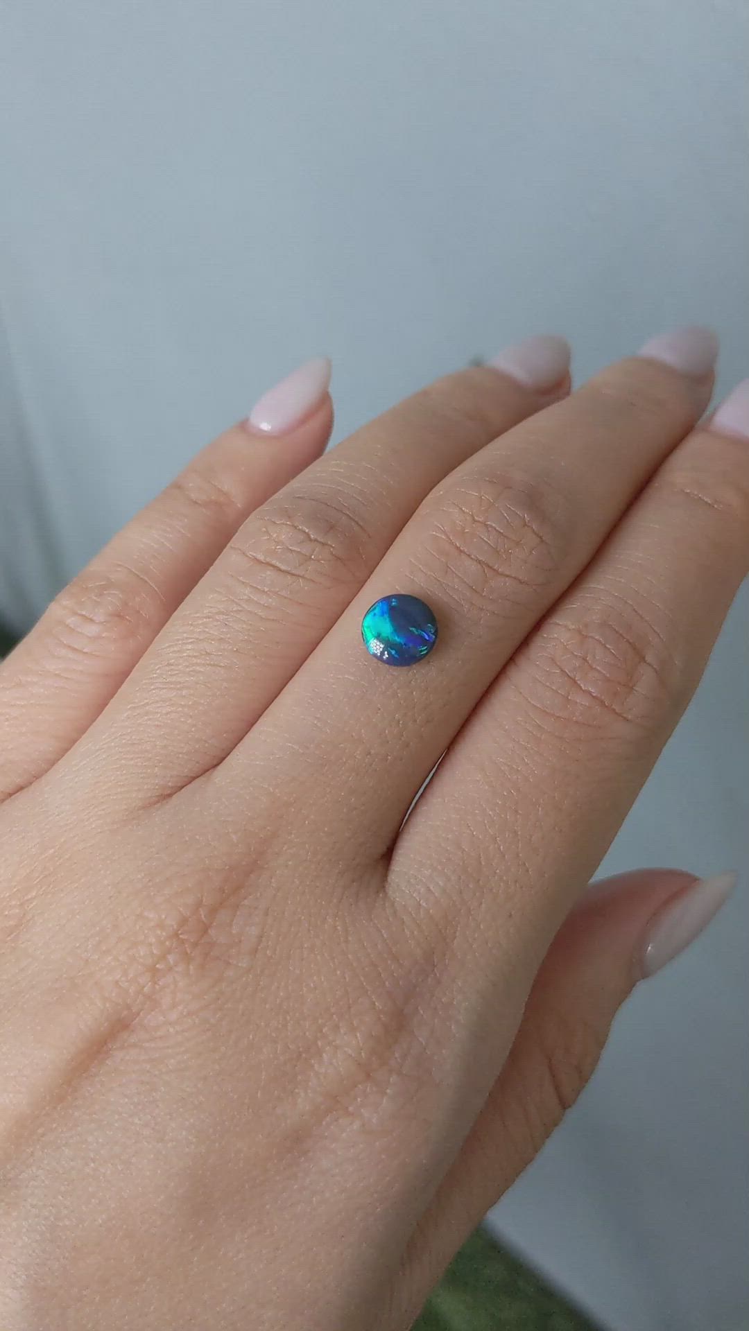 0.76 Ct. Cabochon Black Opal from Australia Size Video