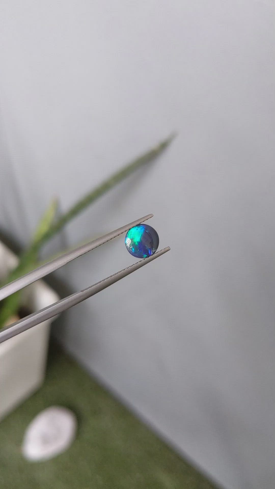 0.76 Ct. Cabochon Black Opal from Australia Size Video