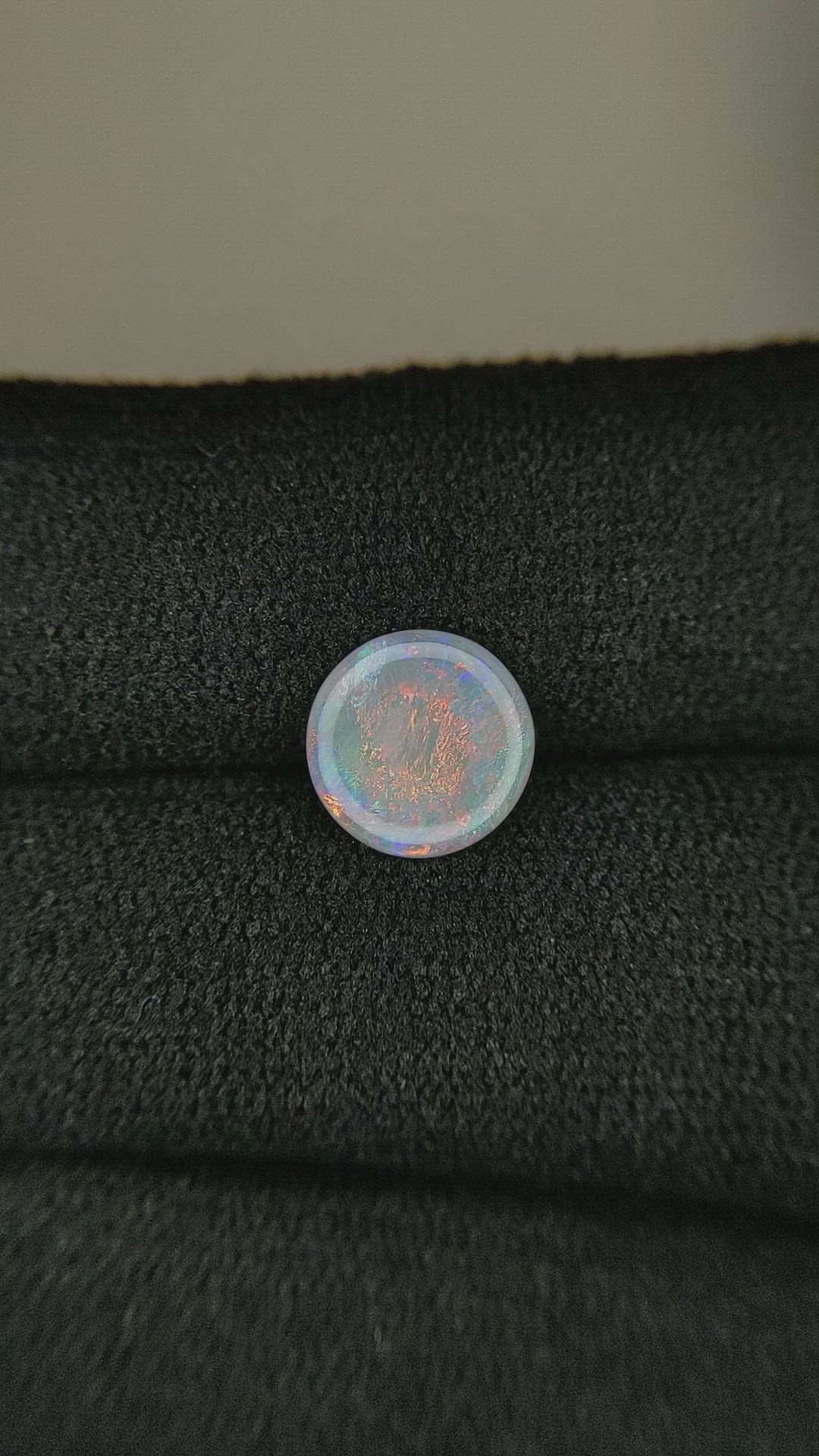 0.66 Ct. Cabochon White Opal from Australia Size Video