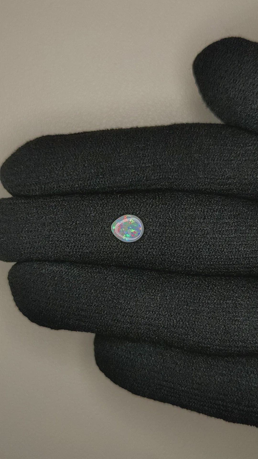 0.34 Ct. Cabochon Semi-Black Opal from Australia Size Video