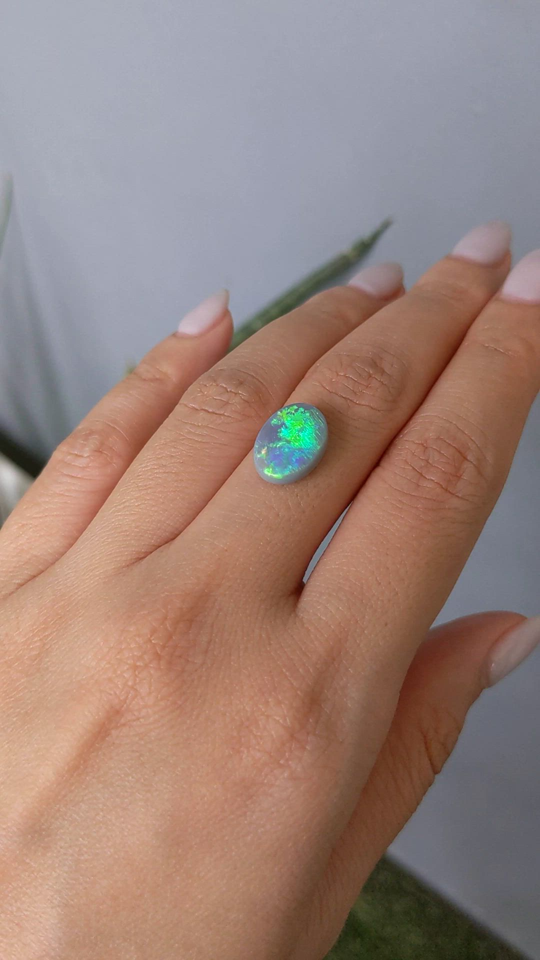 3.29 Ct. Semi-Black Opal from Australia Size Video