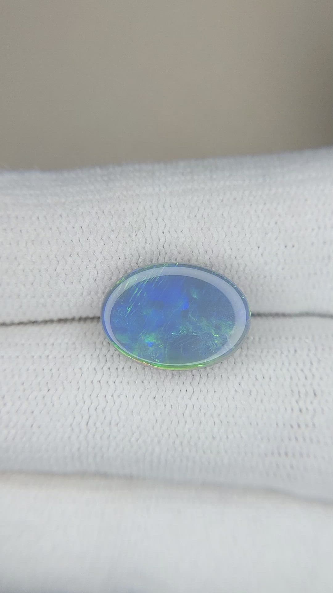 3.29 Ct. Semi-Black Opal from Australia Size Video