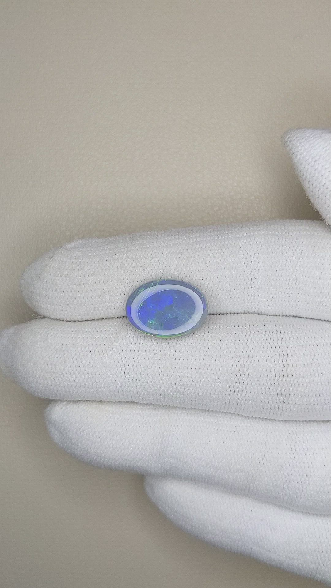 3.29 Ct. Semi-Black Opal from Australia Size Video