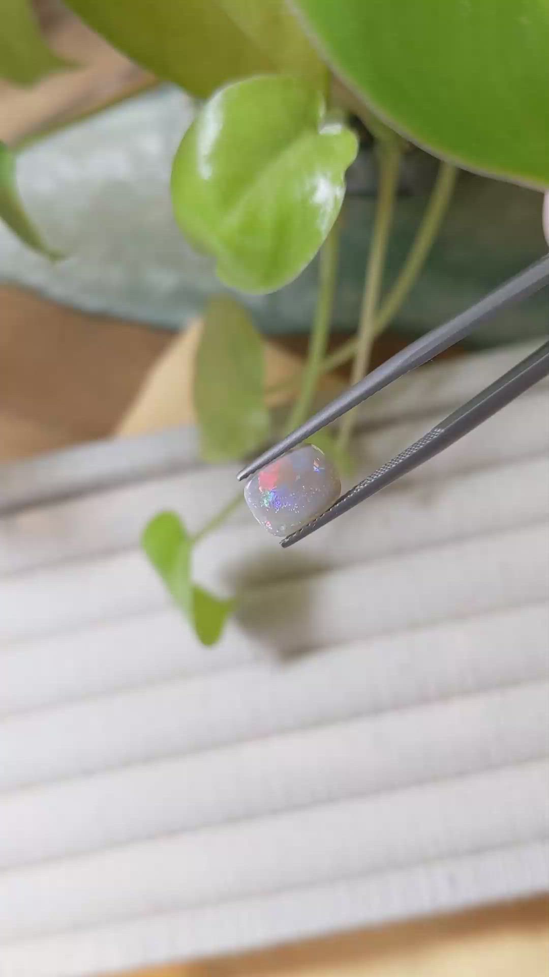 0.83 Ct. White Opal from Australia Size Video