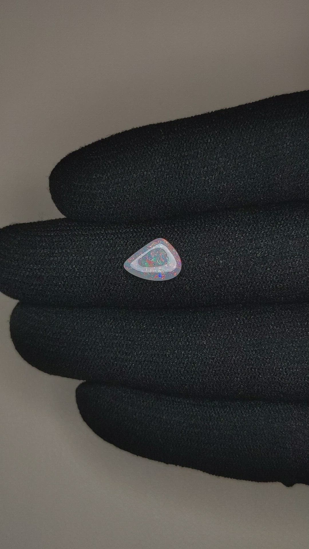 0.69 Ct. Cabochon Semi-Black Opal from Australia Size Video