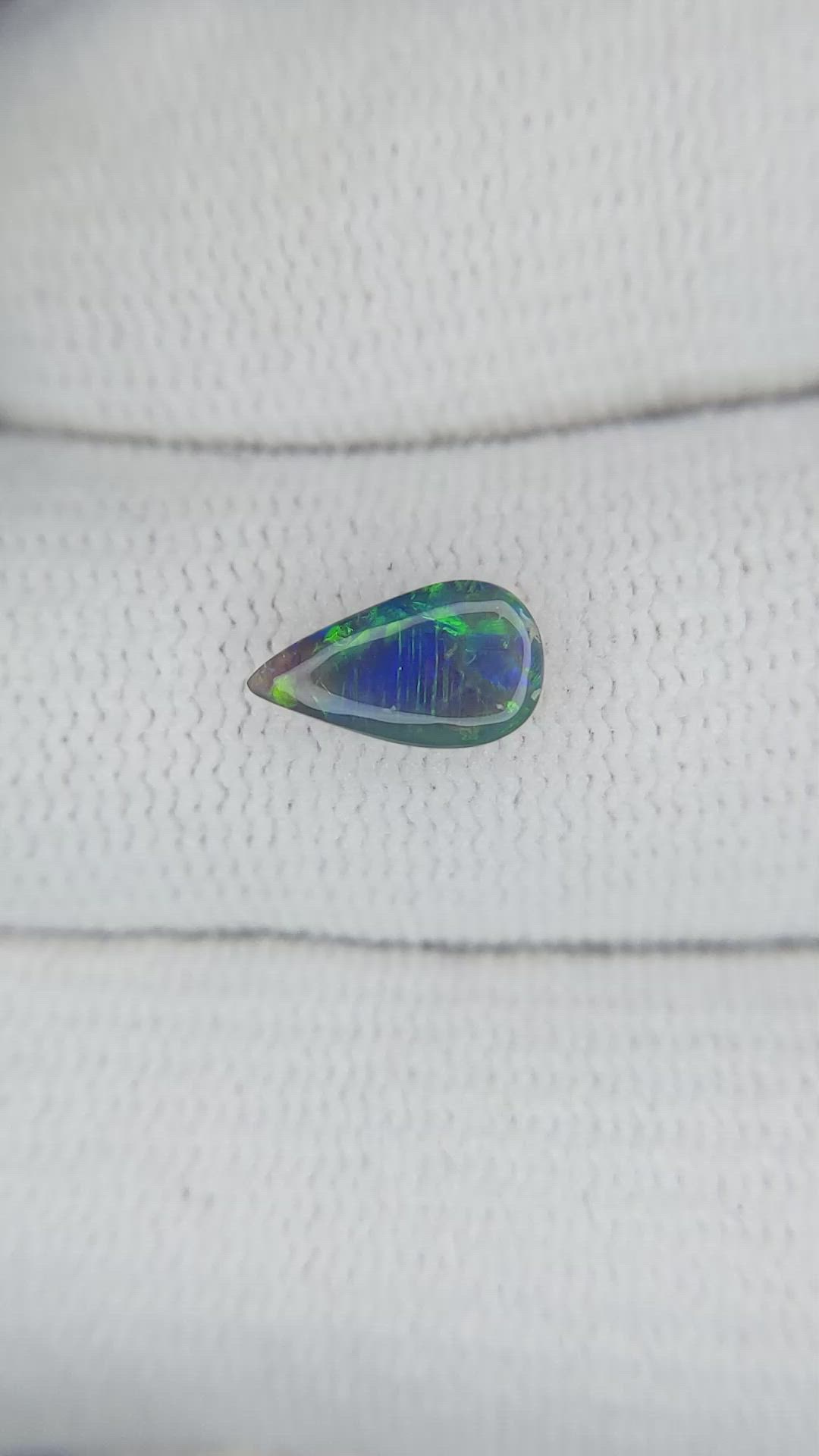 0.63 Ct. Cabochon Black Opal from Australia Size Video