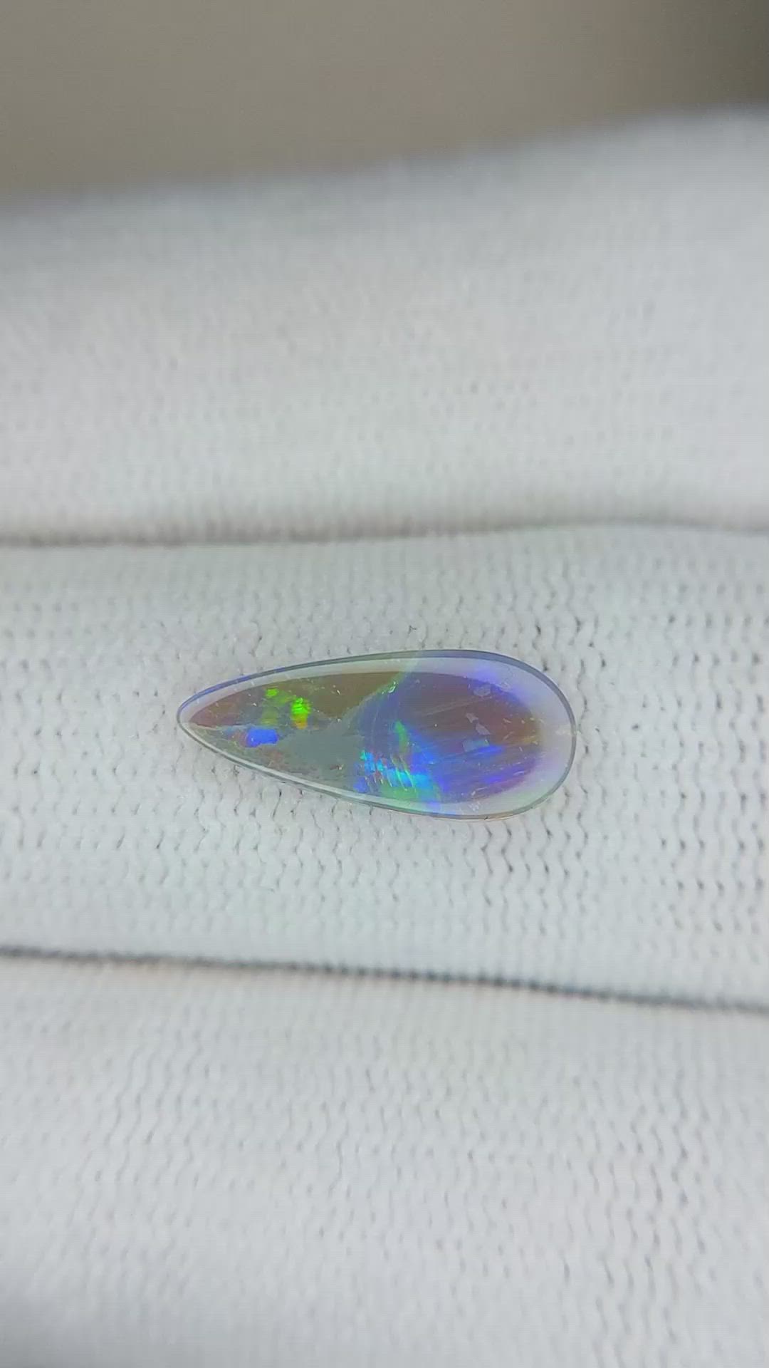 0.84 Ct. Semi-Black Opal from Australia Size Video
