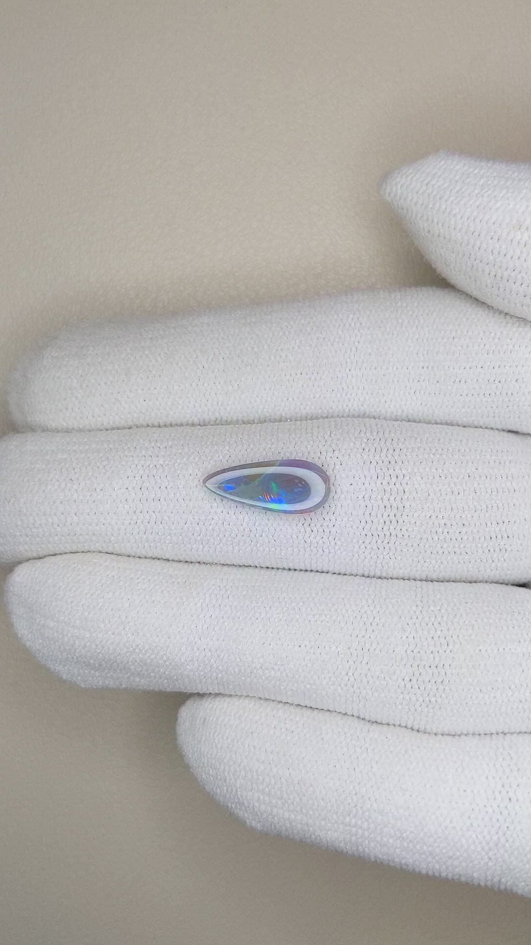 0.84 Ct. Semi-Black Opal from Australia Size Video