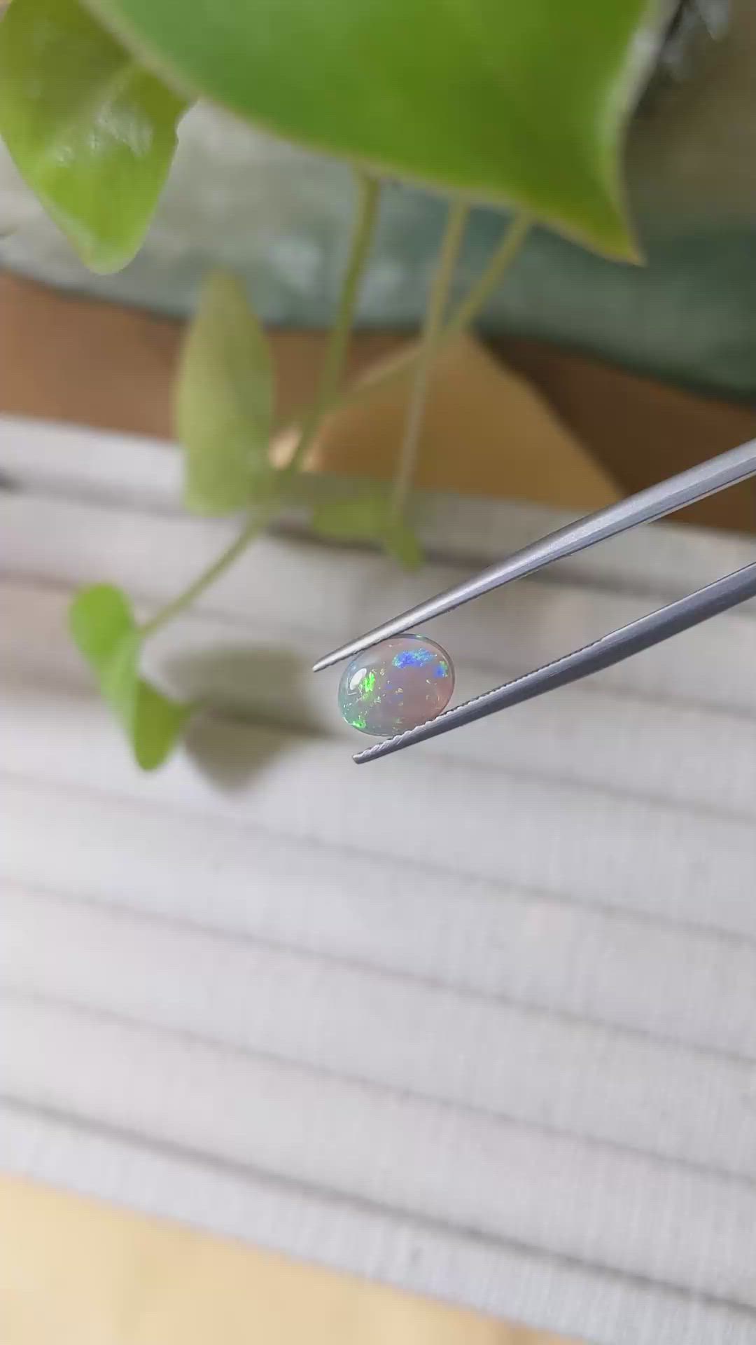 0.91 Ct. Cabochon Semi-Black Opal from Australia Size Video