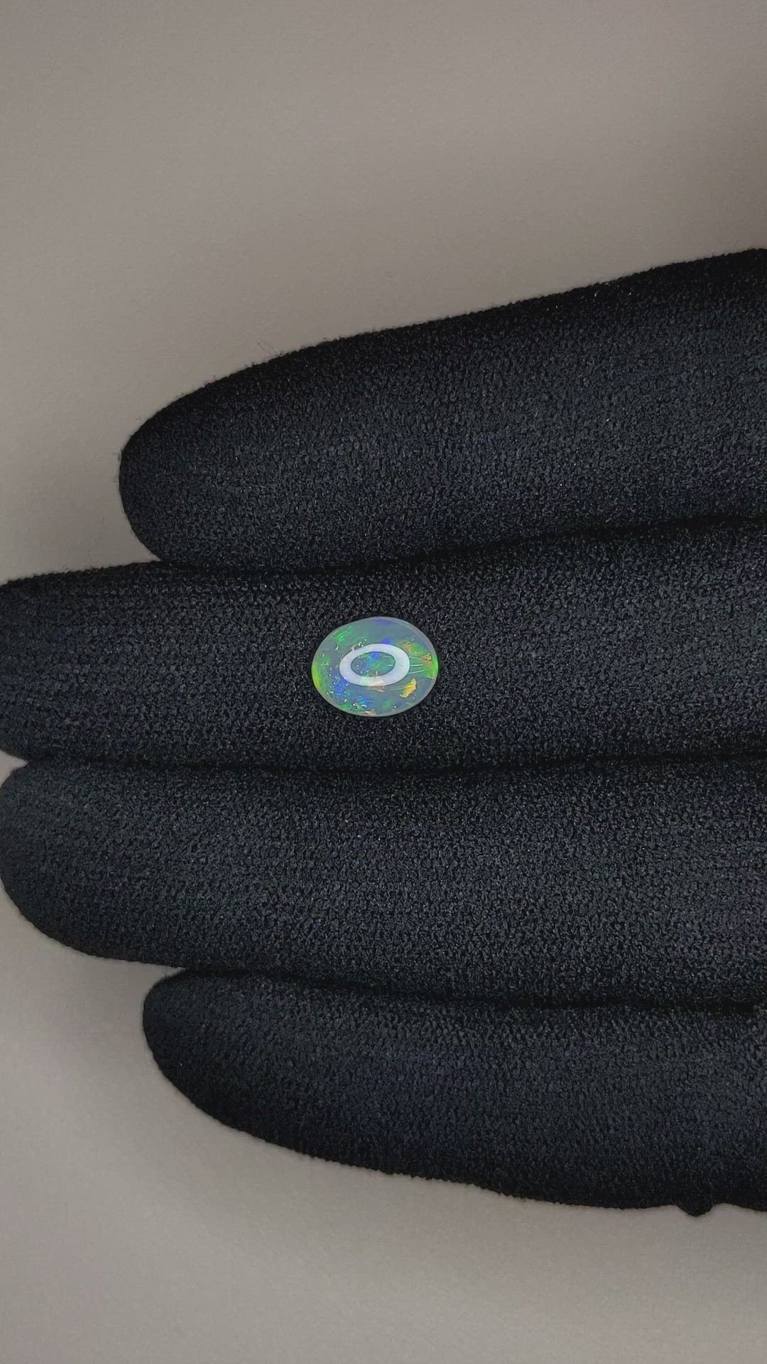 0.91 Ct. Cabochon Semi-Black Opal from Australia Size Video