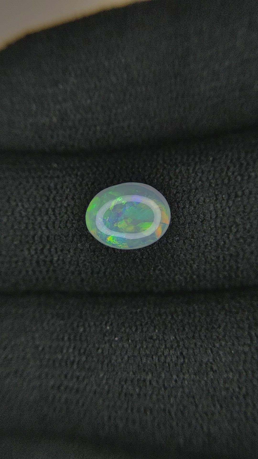 0.91 Ct. Cabochon Semi-Black Opal from Australia Size Video