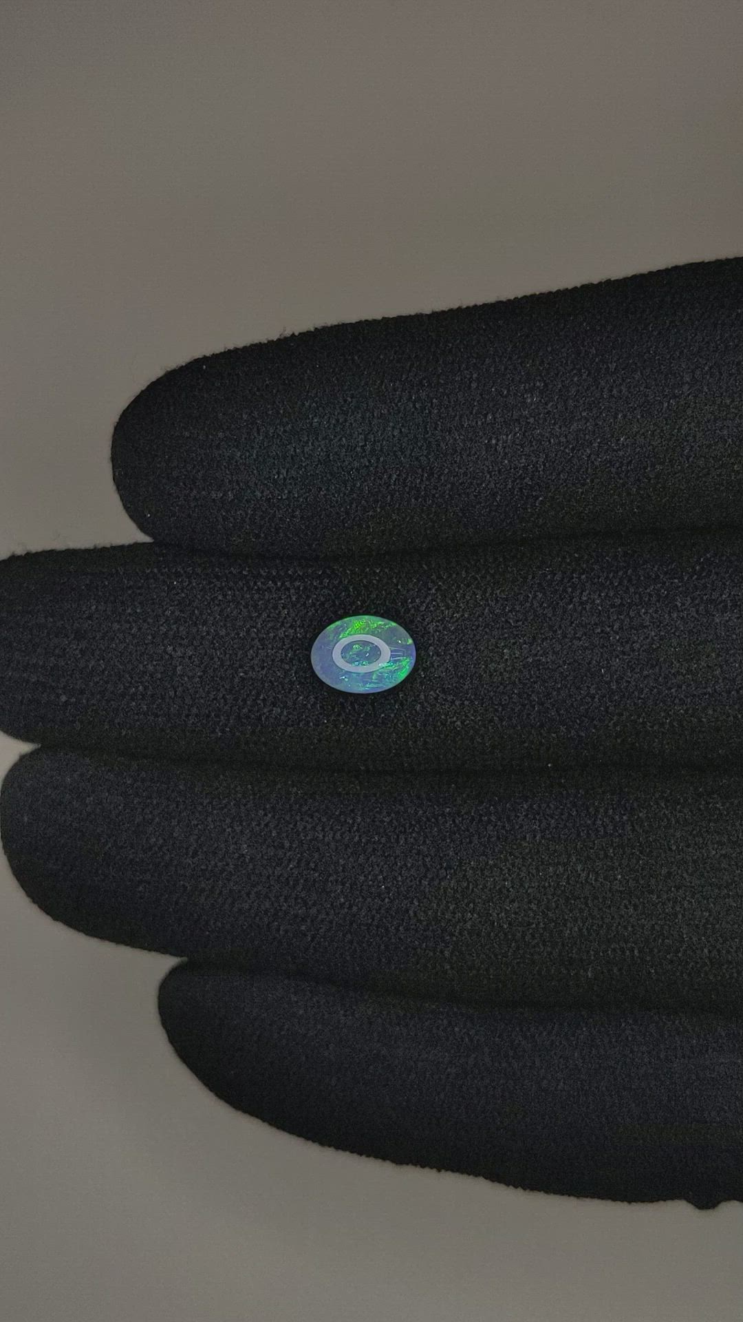 0.44 Ct. Cabochon Black Opal from Australia Size Video