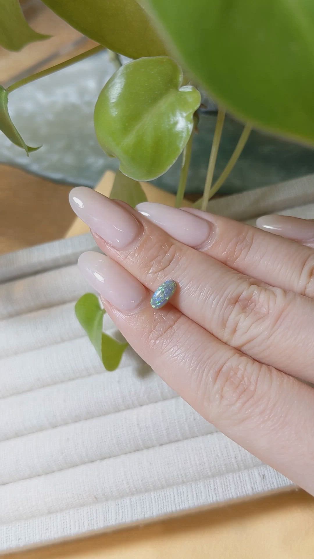 0.69 Ct. Multi Color Cabochon Semi-Black Opal from Australia Size Video