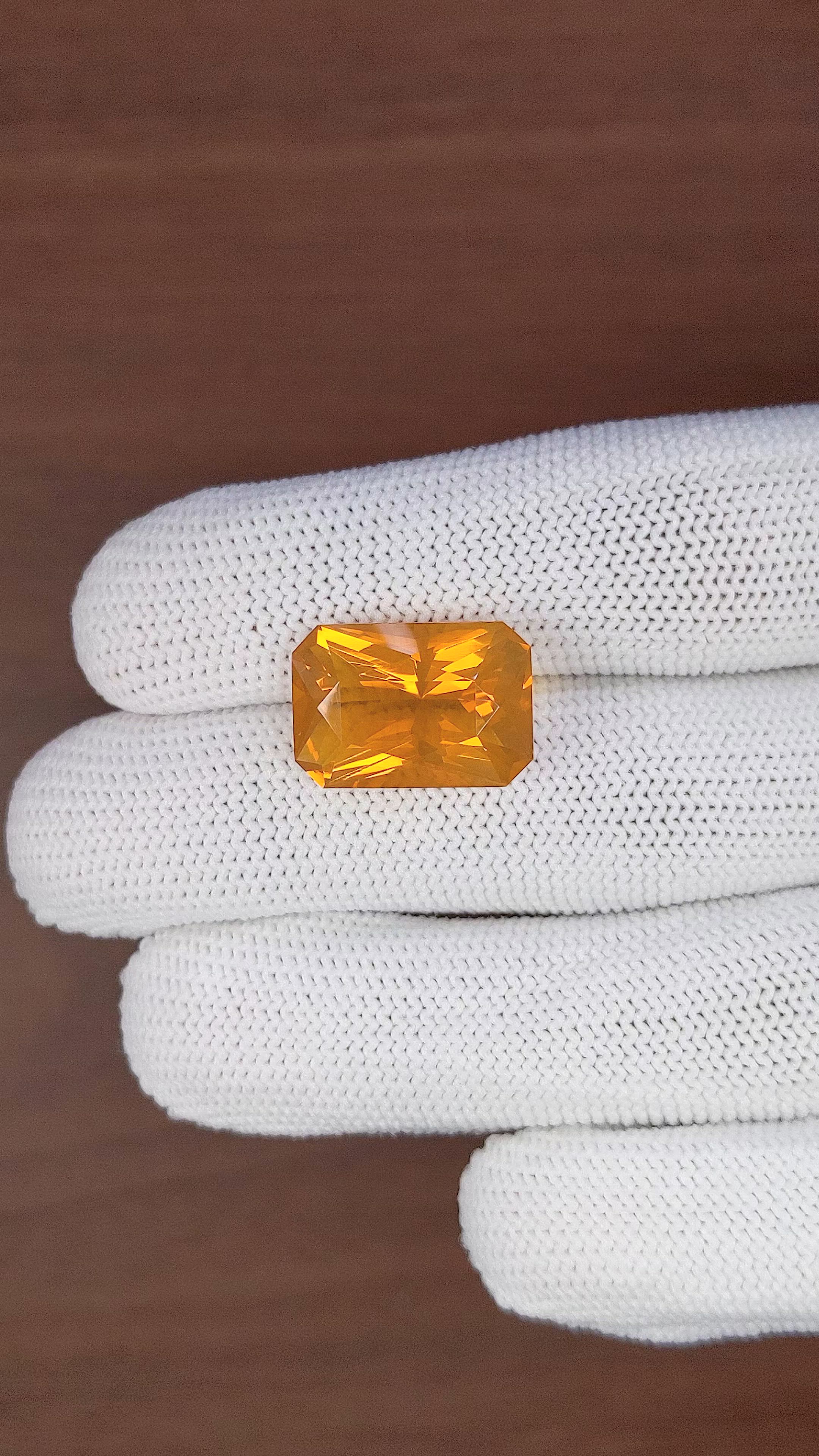 9.54 Ct. Orange Fire Opal from Ethiopia Size Video