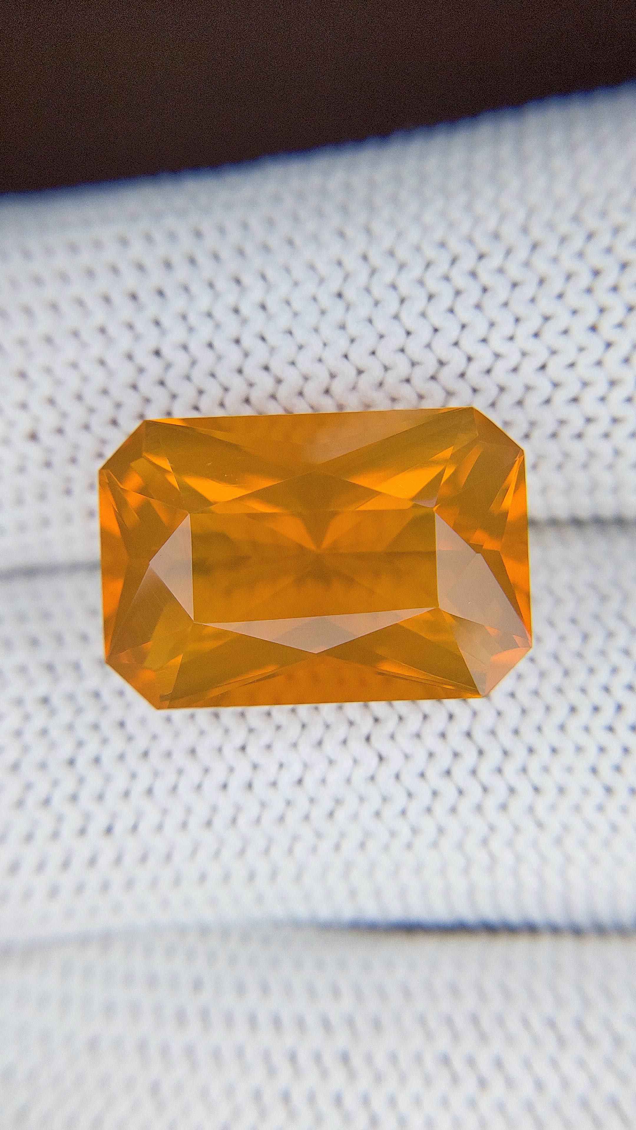 9.54 Ct. Orange Fire Opal from Ethiopia Size Video