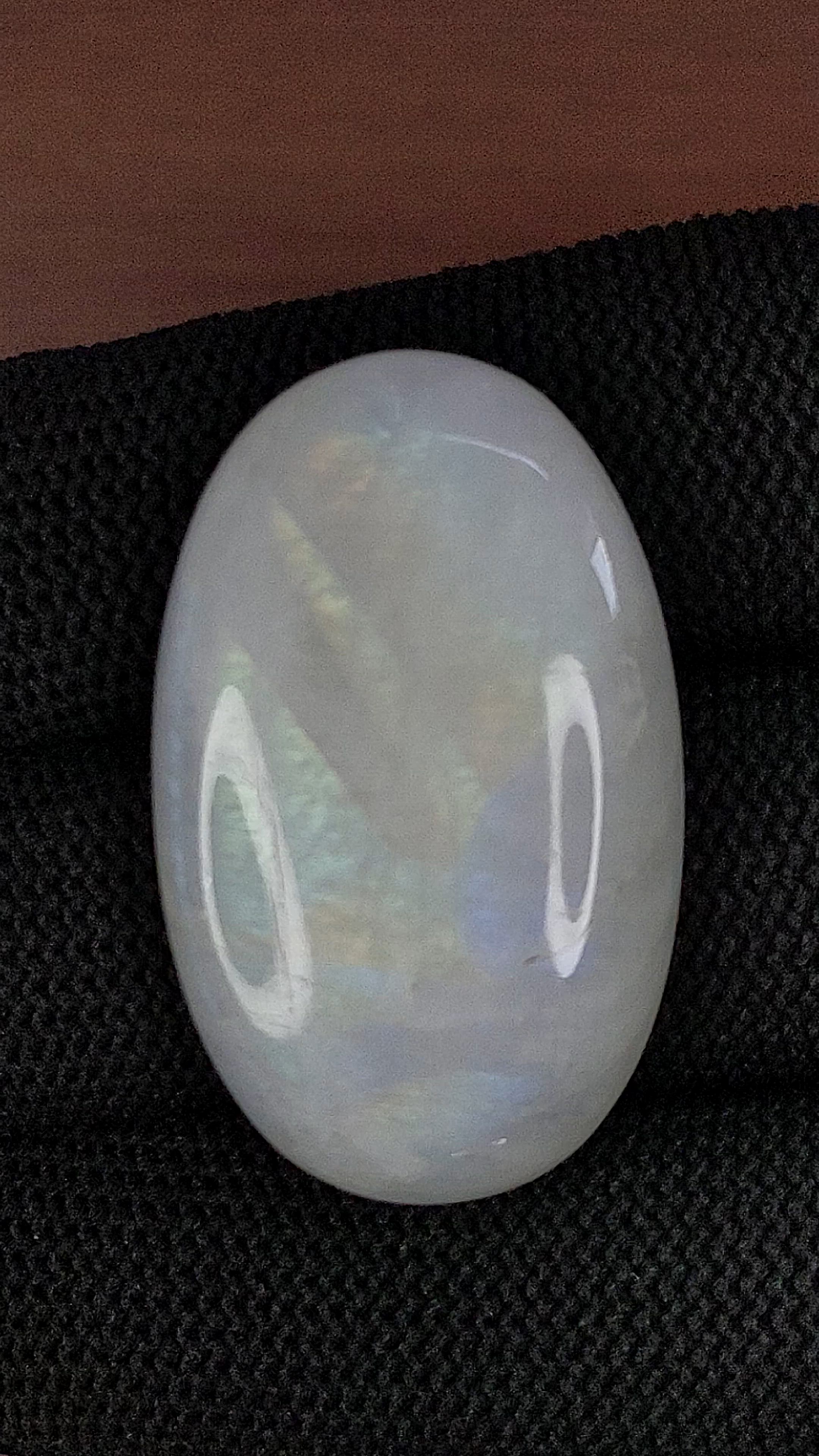51.38 Ct. Multi Color Cabochon White Opal from Ethiopia Size Video