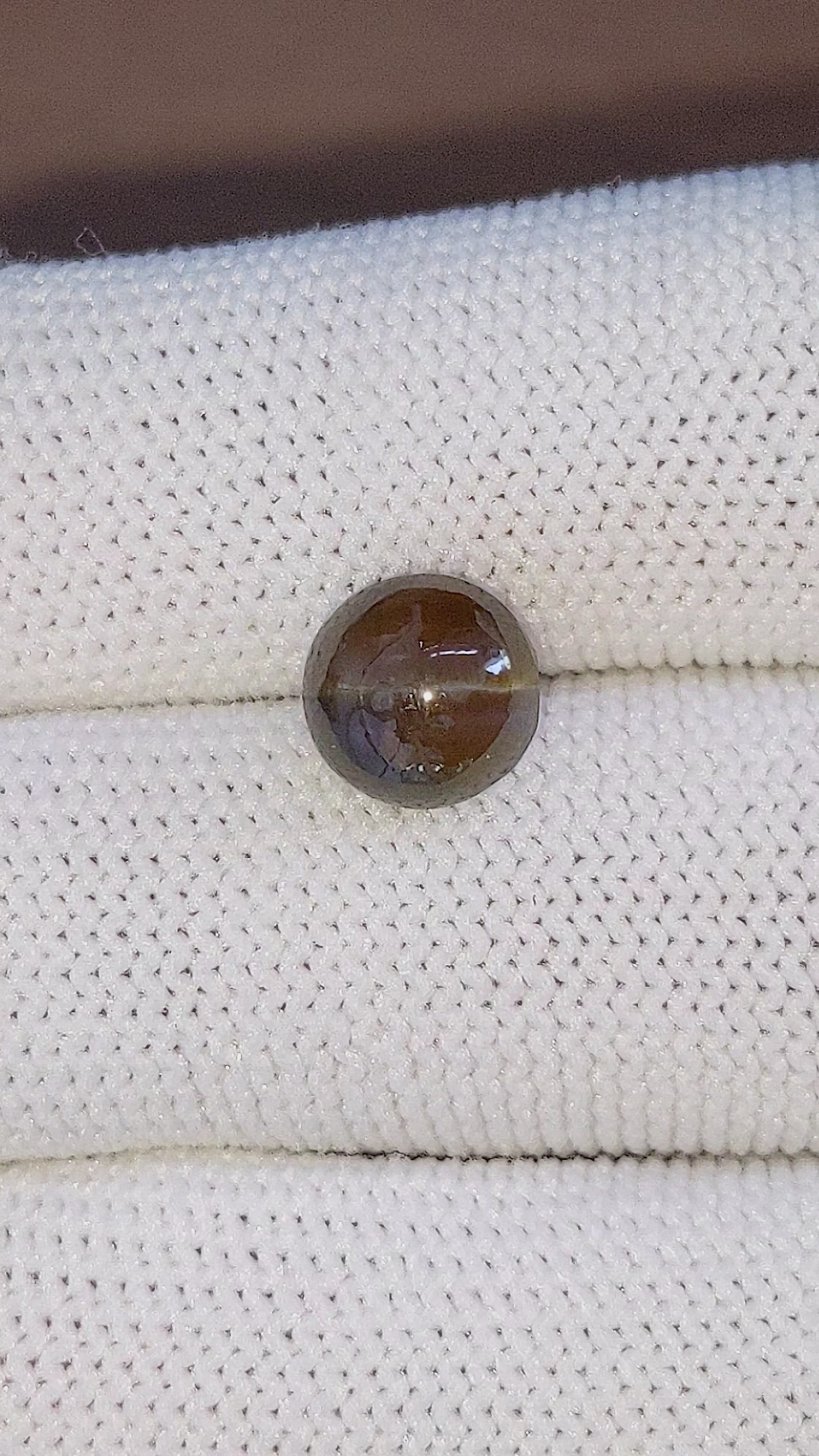 4.62 Ct. Brown Cabochon Chrysoberyl from Ceylon (Sri Lanka) Size Video