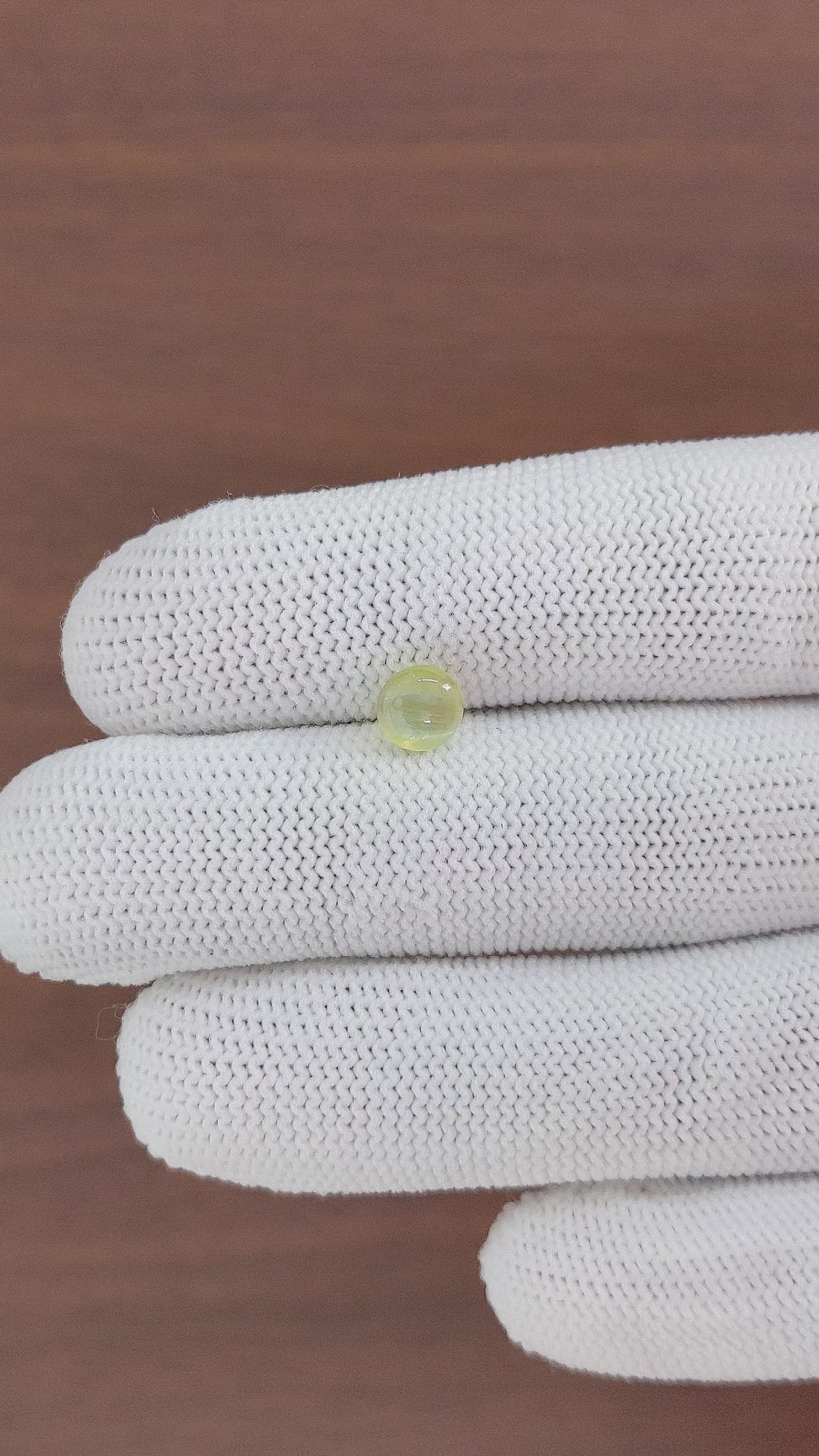 1.58 Ct. Greenish Yellow Cabochon Chrysoberyl from Ceylon (Sri Lanka) Size Video