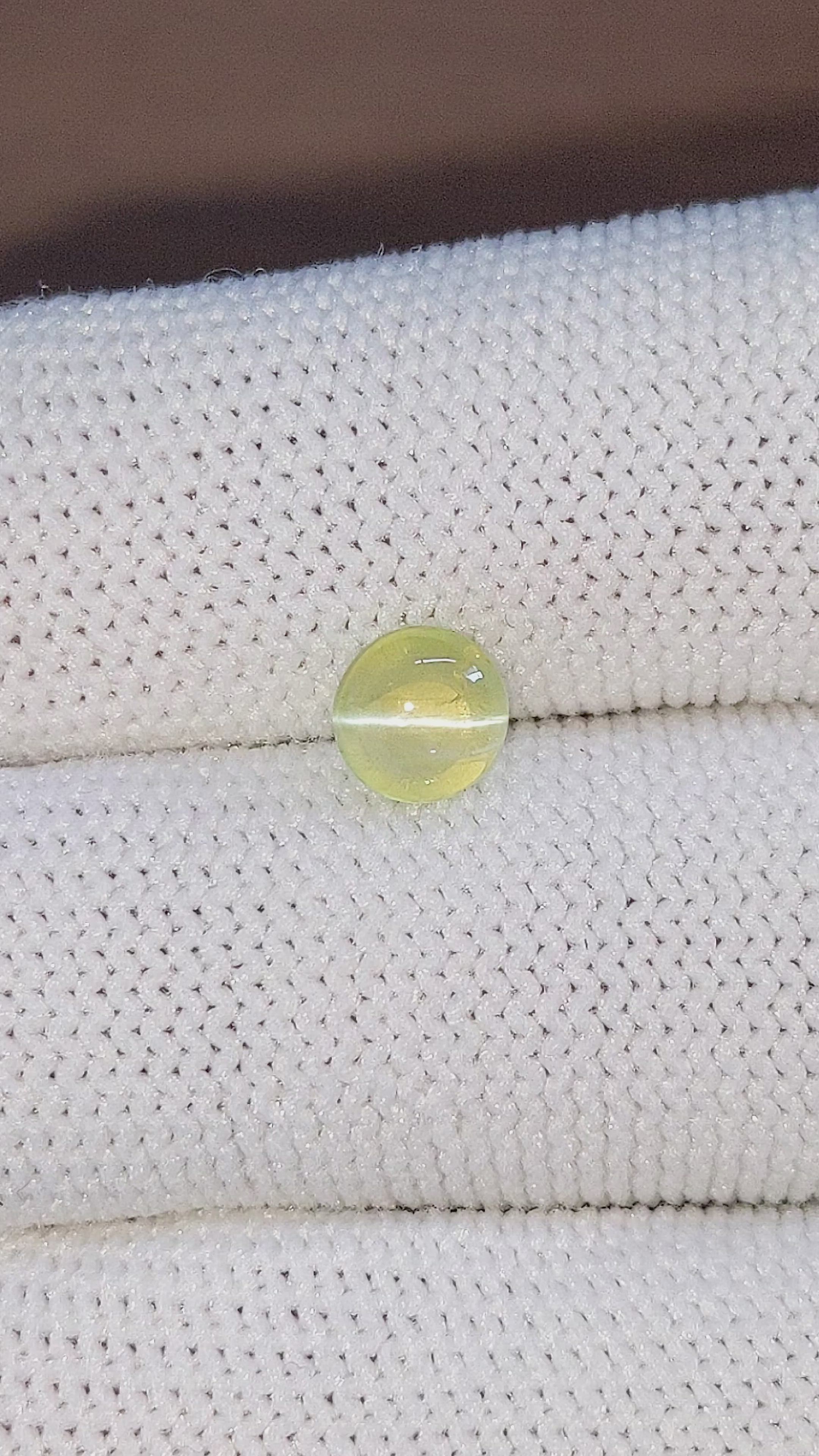 1.58 Ct. Greenish Yellow Cabochon Chrysoberyl from Ceylon (Sri Lanka) Size Video
