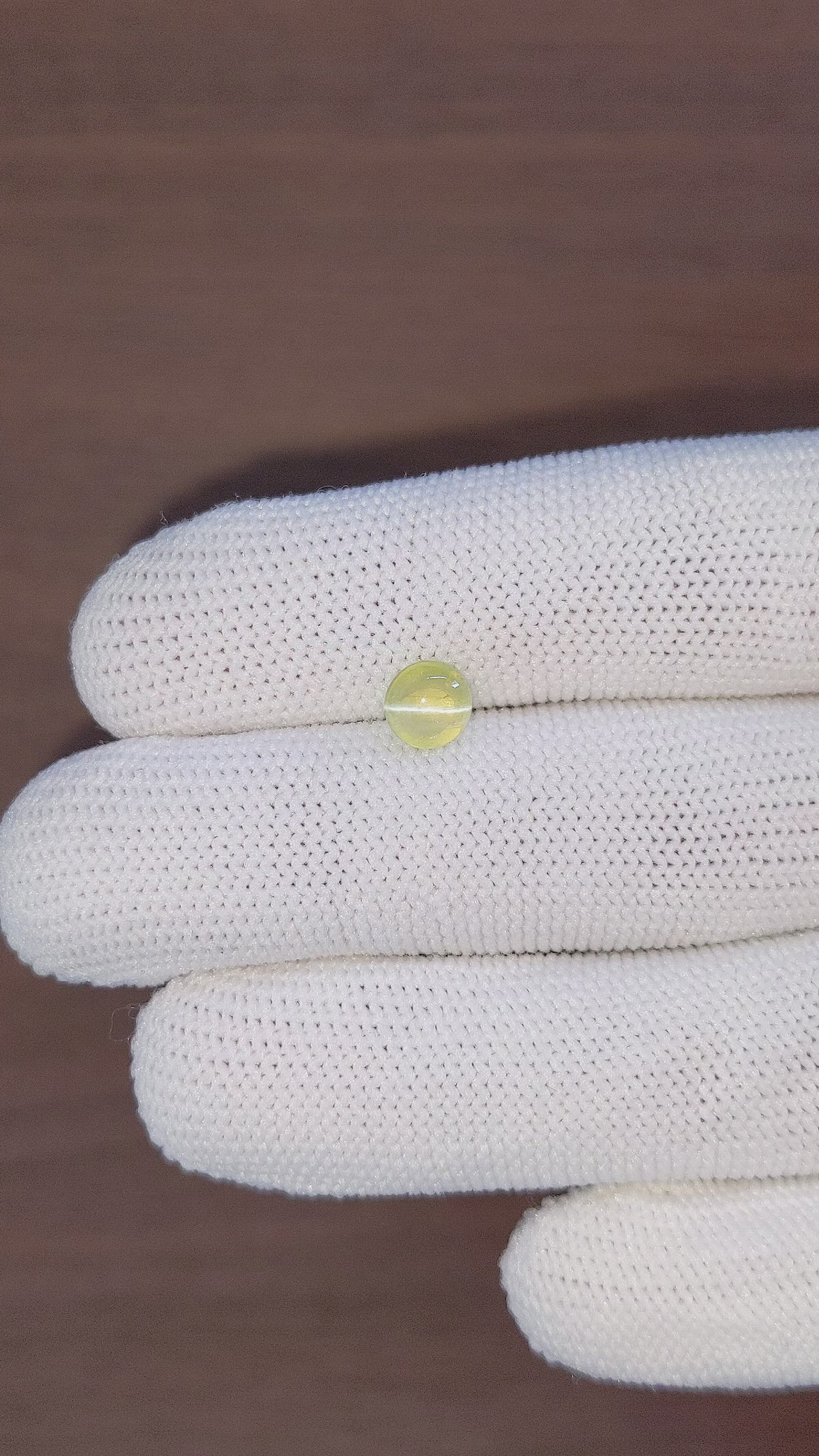 1.58 Ct. Greenish Yellow Cabochon Chrysoberyl from Ceylon (Sri Lanka) Size Video