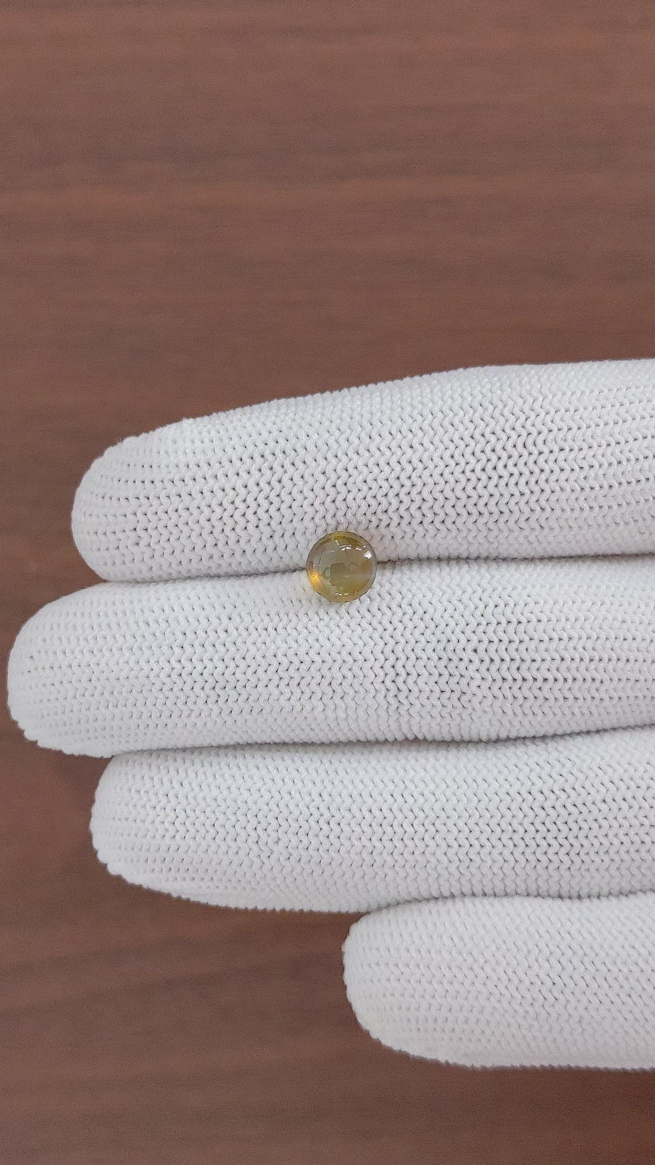 1.85 Ct. Greenish Brown Cabochon Chrysoberyl from Ceylon (Sri Lanka) Size Video