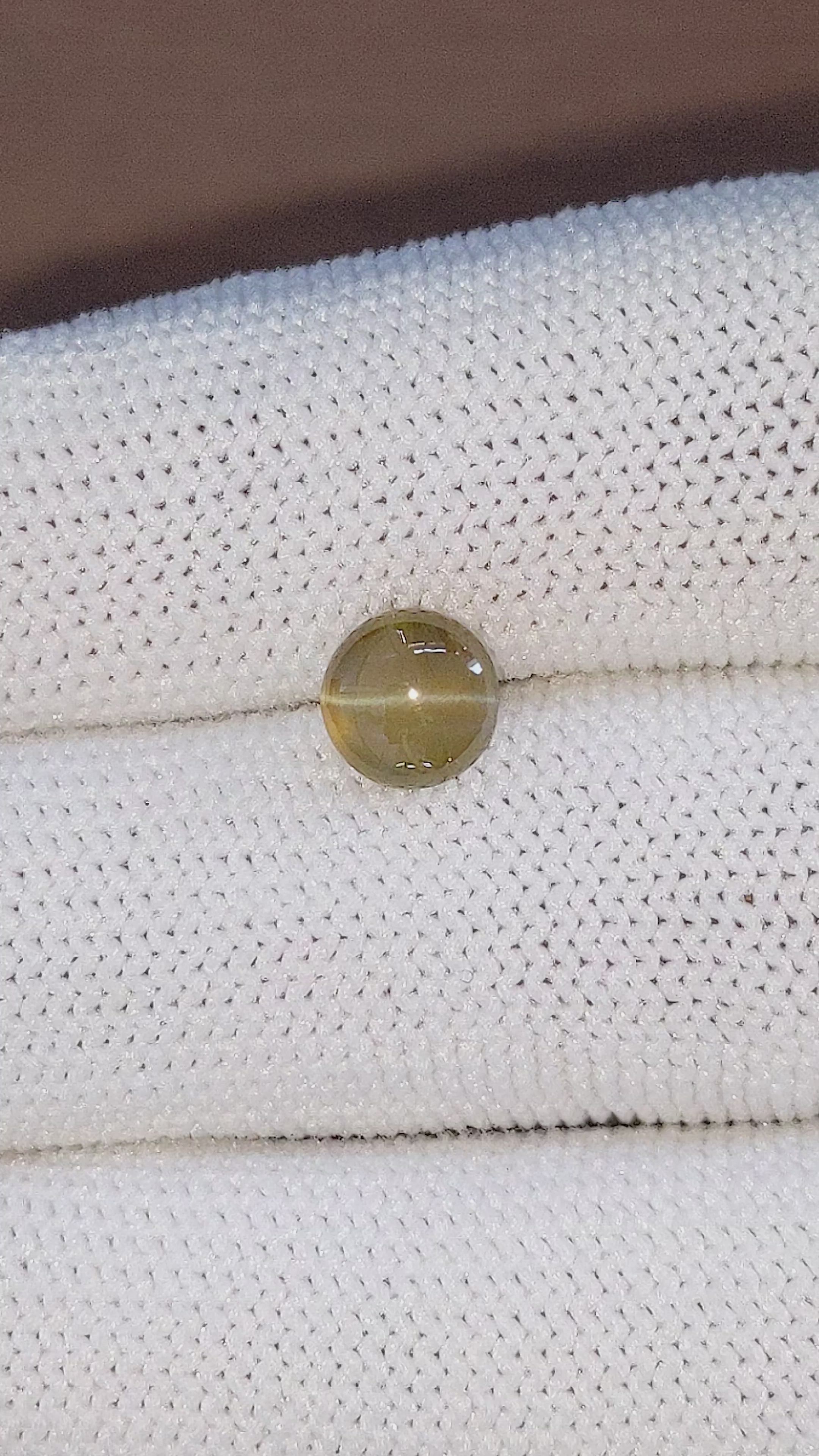 1.85 Ct. Greenish Brown Cabochon Chrysoberyl from Ceylon (Sri Lanka) Size Video
